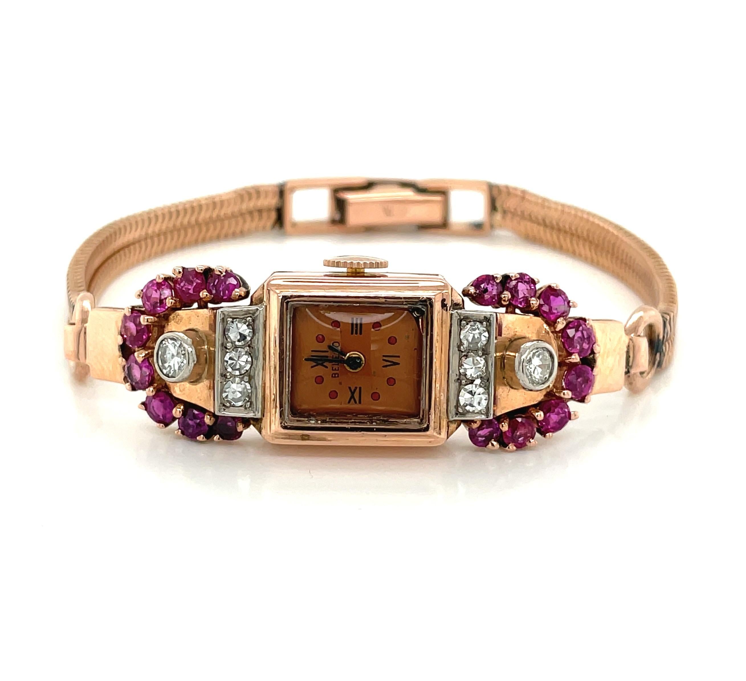 Montre-bracelet art déco en or rose 14 carats avec rubis et diamants Pour femmes en vente