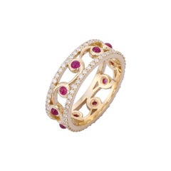 Bague en or jaune 14 carats avec rubis et diamants