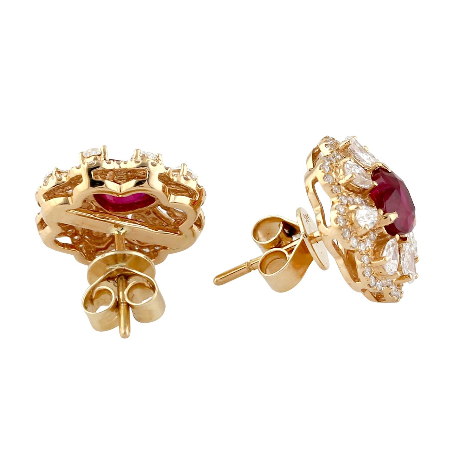 Cast from 14-karat gold, these beautiful stud earrings are hand set with 1.9 carats heart shape rubies & 1.3 carats of sparkling diamonds. 

FOLLOW  MEGHNA JEWELS storefront to view the latest collection & exclusive pieces.  Meghna Jewels is proudly