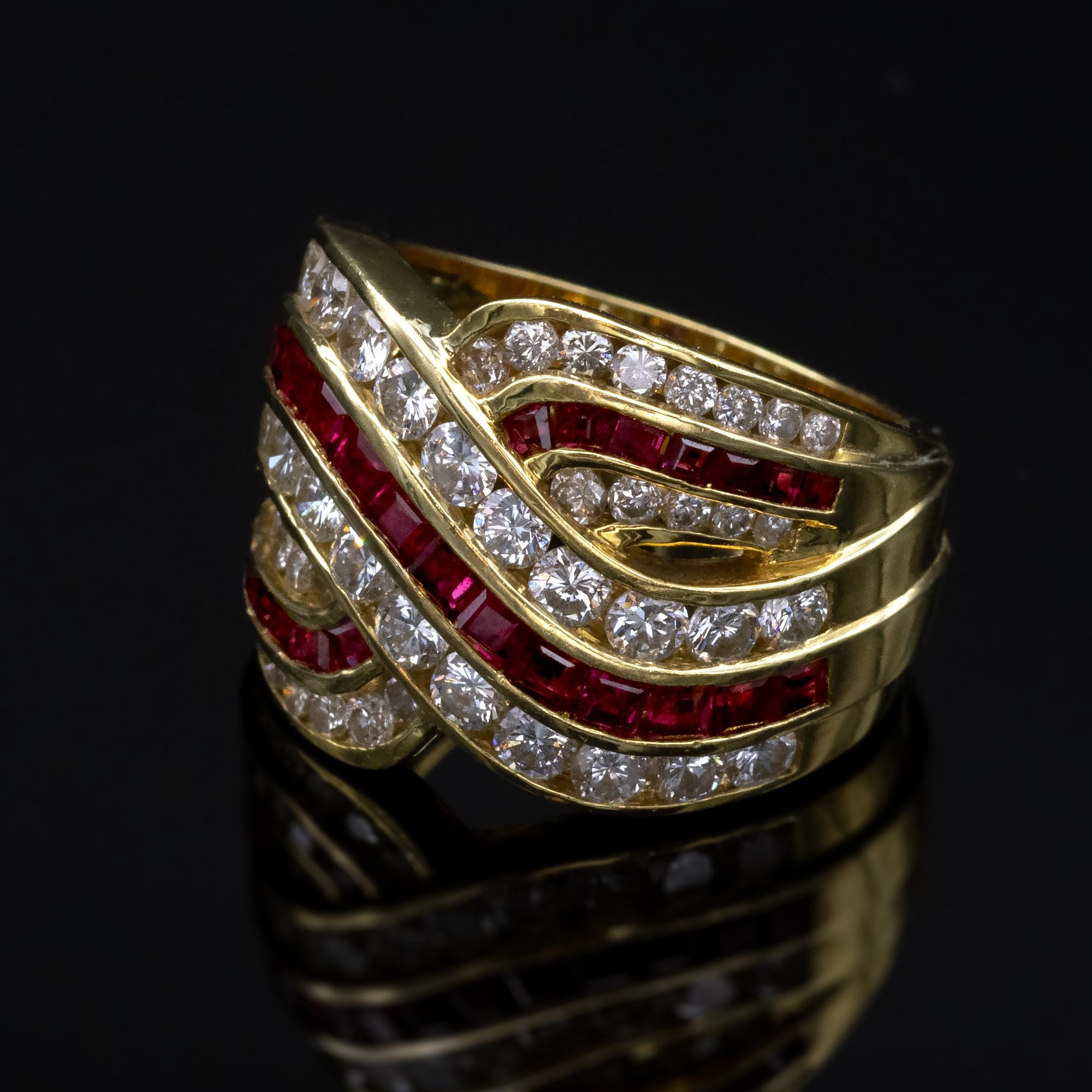 Classy wide solid 18 Karat yellow gold ring channel set with square rubies and white diamonds. 
excellent make, bearing the french 18 Kt hallmark state stamp.
Diamonds : ±2.16 carat ( F-G VVS-VS )
Ruby: ± 1.34 carat