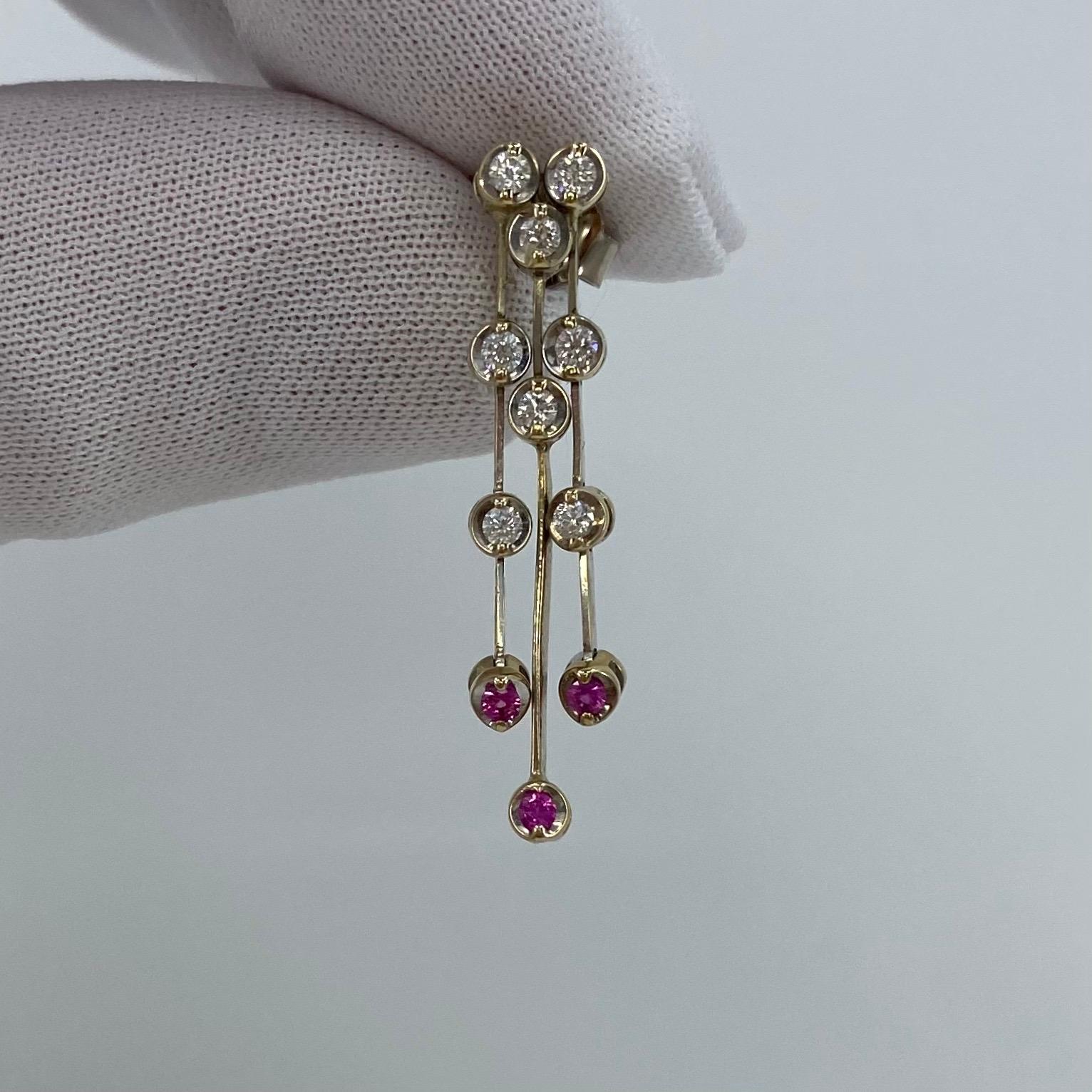 Taille ronde Boucles d'oreilles pendantes en or blanc 18 carats avec rubis et diamants en forme de cascade en vente