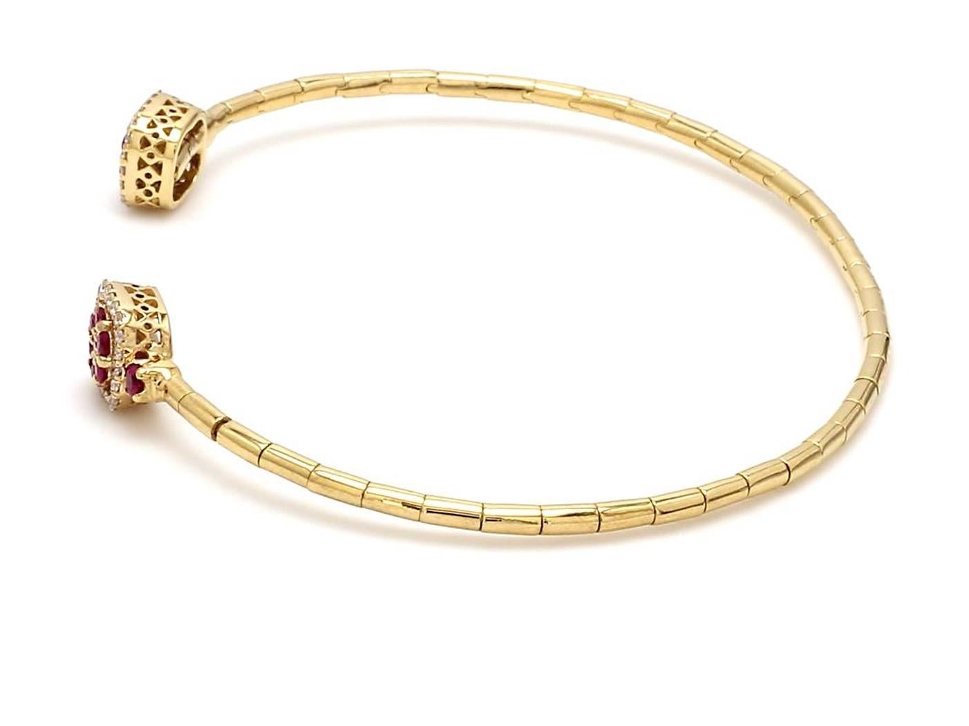 A Beautiful Handcrafted Flexible Cuff in 18 Karat Yellow Gold  with Natural Round Ruby Center and Diamonds Halo. A perfect Daily wear Jewelry

Natural Center Ruby Details
Pieces : 16 Pieces
Weight : 0.39 Carat 
AAA Quality Mozambique Ruby

Natural