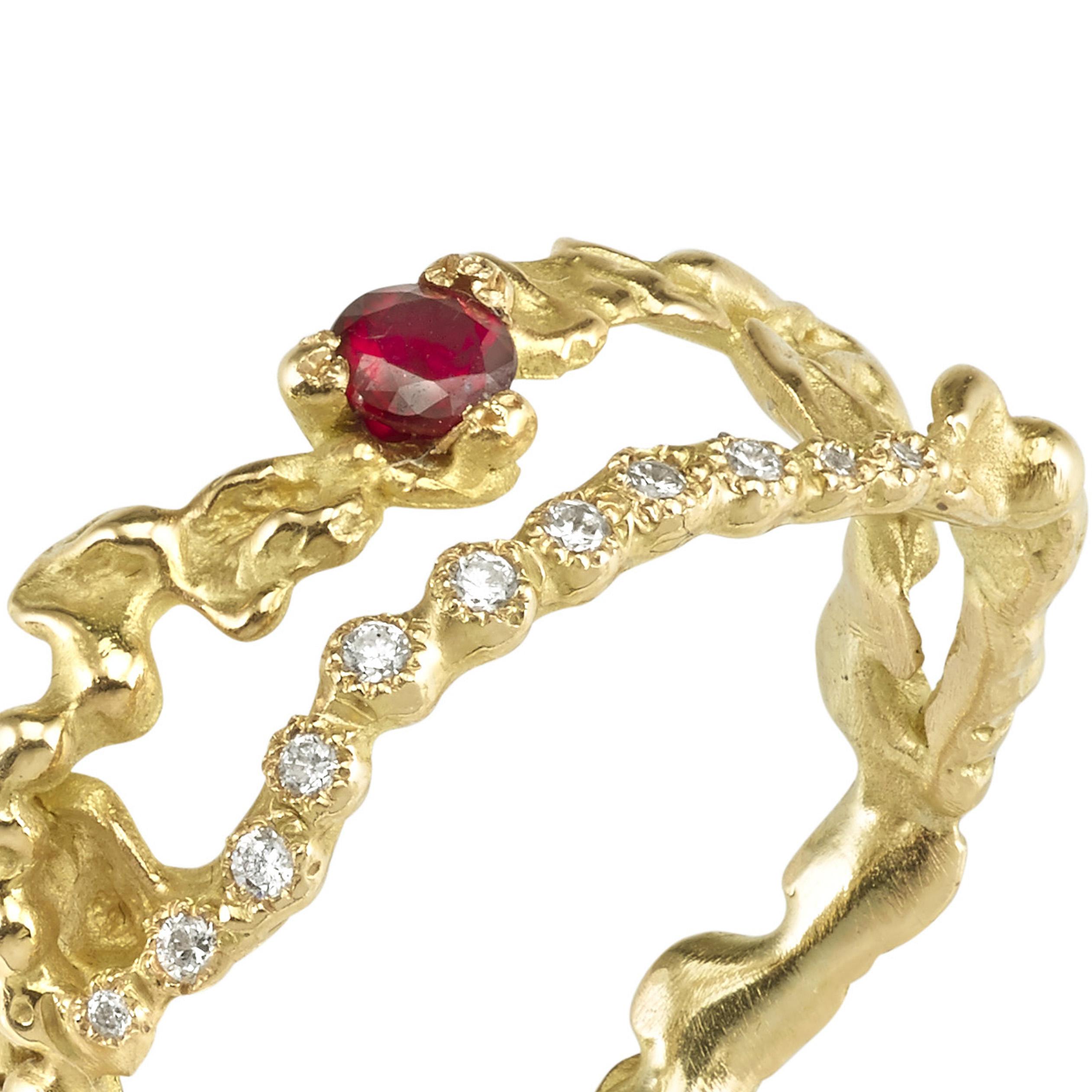 This Anais Rheiner ring is 18 Karat yellow gold approximately 3.5 grams. It is chiseled and assembled with asymmetric arabesque patterns. It is set with a ruby of approximately 0.02 carat and diamonds.
It can be made to size upon request.
The