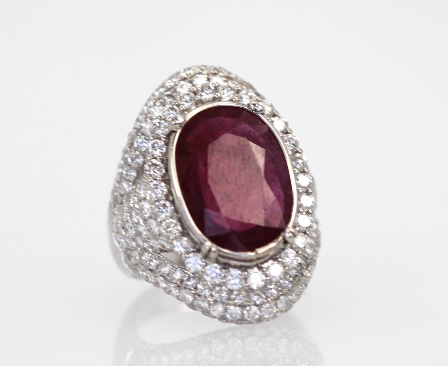 This unusually large, transparent ruby has a very large table with a small depth, so although it is 4.58 carats it presents as an 8 carat stone. As is typical of most rubies sold after 1950, this ruby has lead glass filling which is common, whether