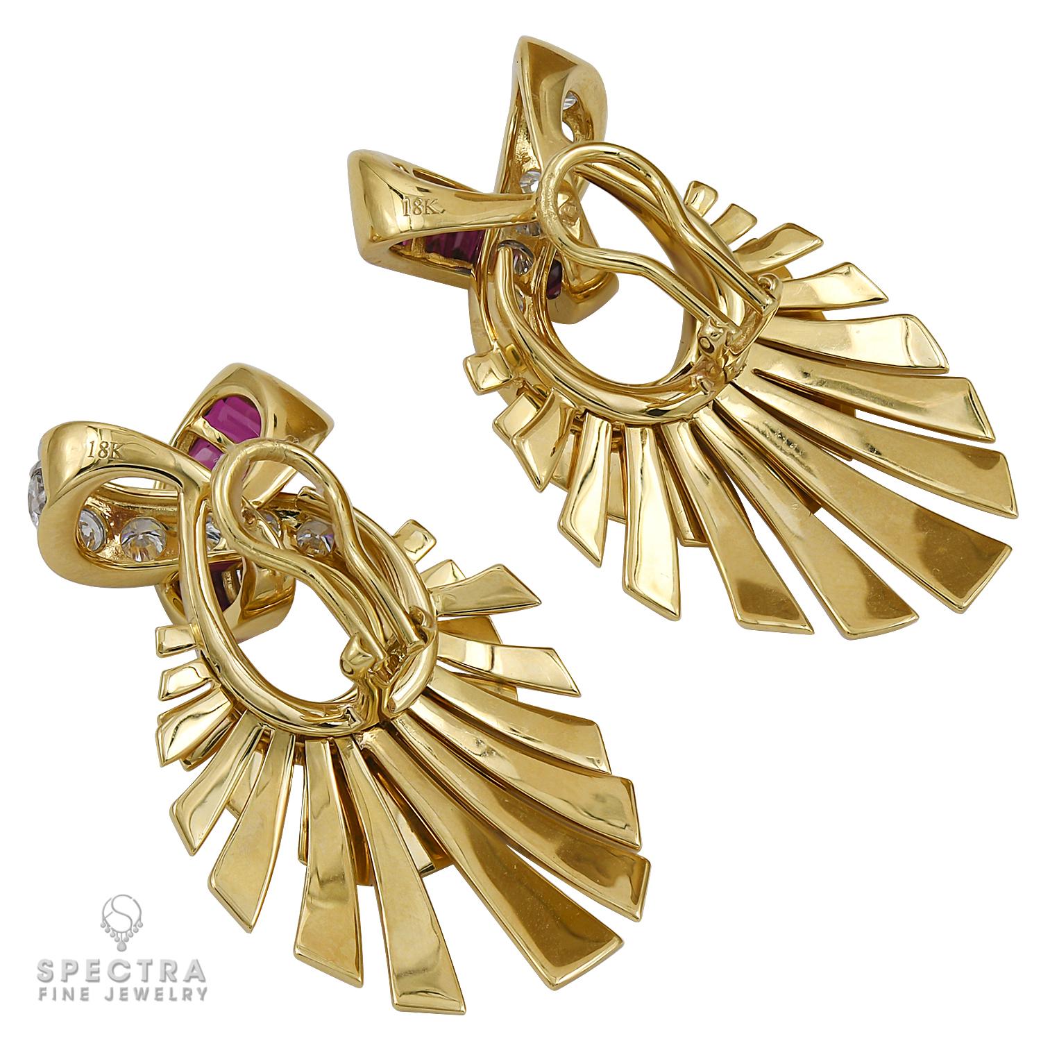 These flirtatious Fan Earrings are made in the Contemporary era, 2018, yet suggest a retro glamour that harkens back to the Art Deco period. This mirror image pair of pierced earrings with French clips is crafted in highly polished 18K yellow gold