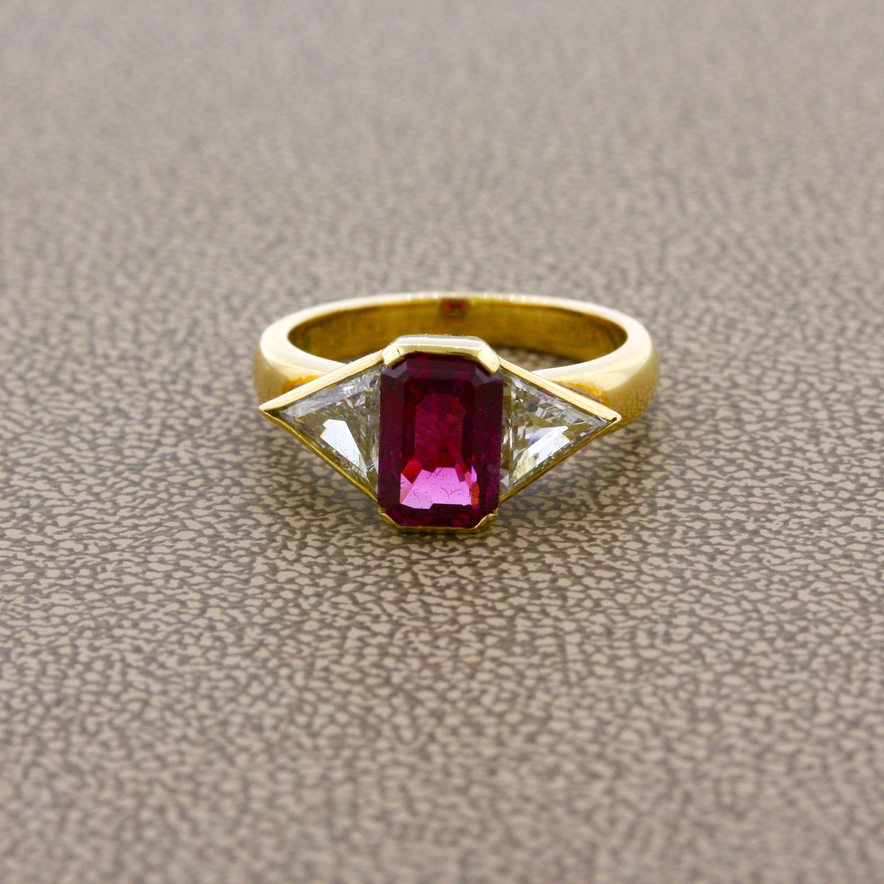 A lovely sleek and simple modern designed featuring fine gemstones and diamonds.  The ruby is a very fine stone weighing 2.31 carats and comes from a more unique origin in Vietnam. It has a rich deep and purplish-pinkish-red color which is just so