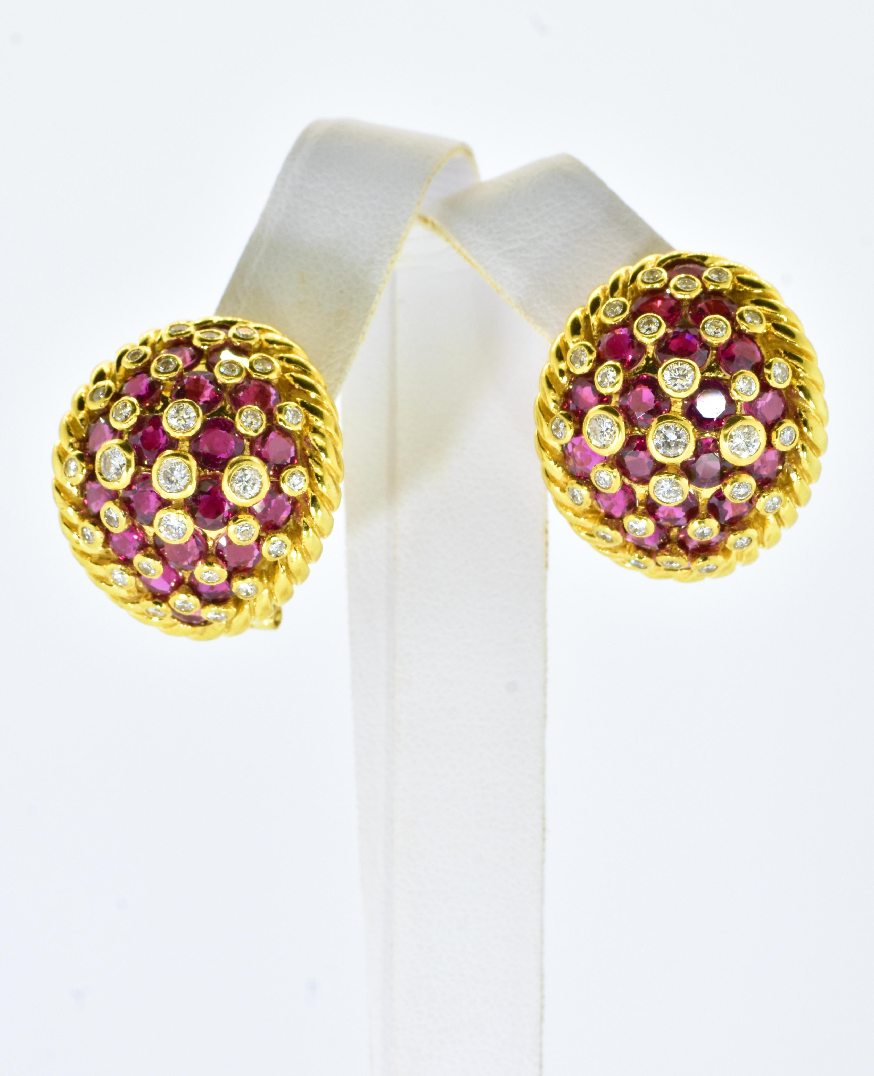18K, Diamond and Ruby vintage Earrings.   These earrings done in 18K yellow gold were set with diamonds and rubies.  They have a weight of 22.6 grams, possess 58 diamonds estimated to weigh 1.90 cts. these diamonds are all well matched in their fine