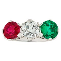 Anello con rubino, diamante e smeraldo
