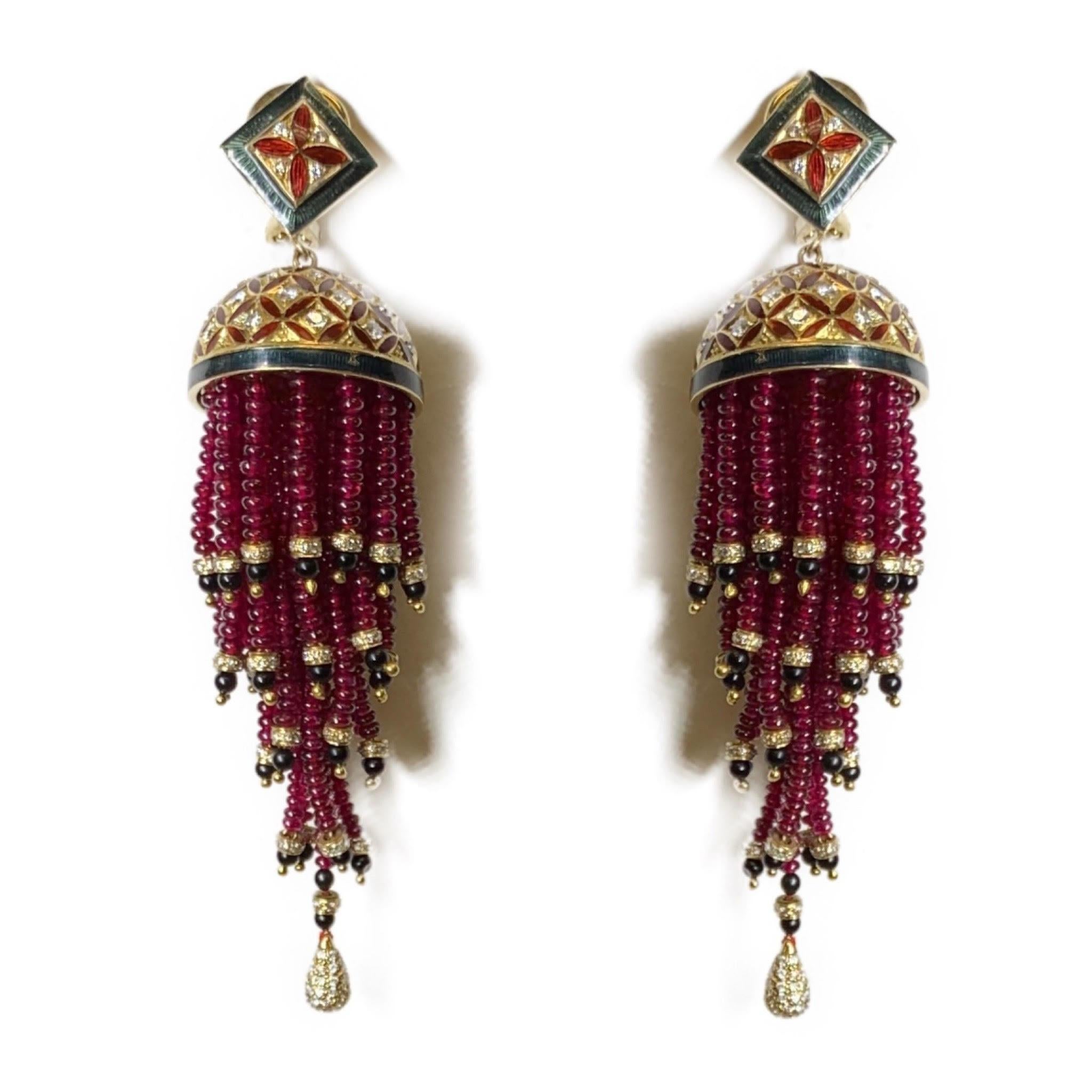 These Ruby, Diamond, and Enamel earrings include a dome with diamonds with ascending ruby beads. These incredibly unique and magnificent earrings are a combination of colors that create a show stopping earring. 
Ruby and Diamond Enamel Earrings
18