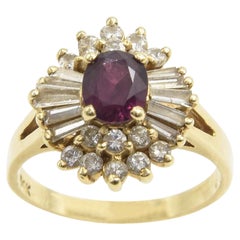 Anello da cocktail in oro con diamante e rubino