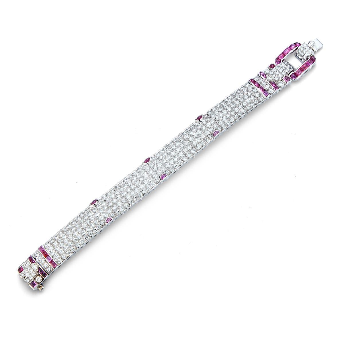  Ruby & Diamond Belt Buckle Bracelet,  cabochon rubies & round cut diamonds  set in 18K white gold
 288 round cut diamonds approximately 15.76 Cts & 36 rubies approximately .51 Cts  
Measurements: 7