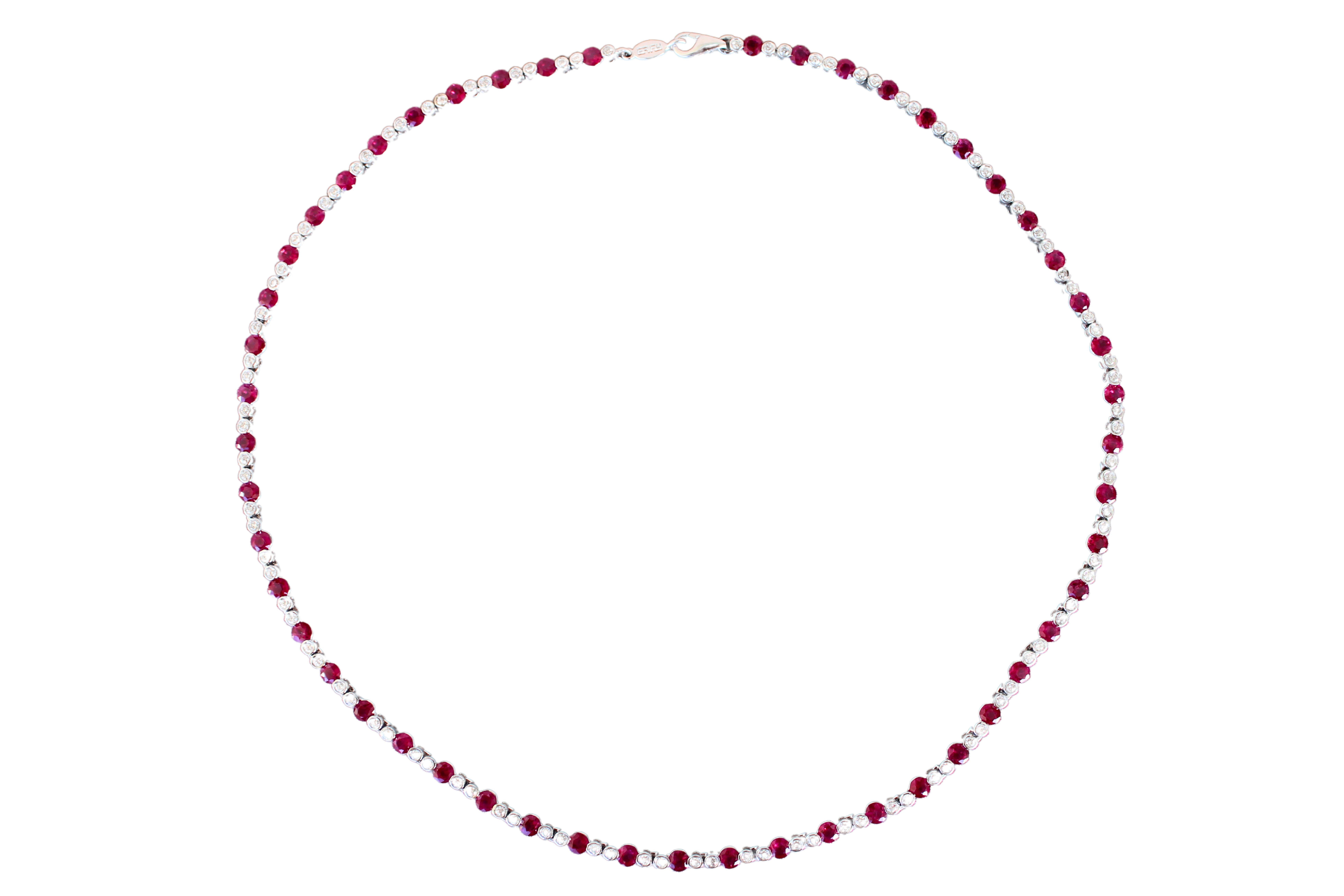 Ruby Diamond Bezel Set Tennis Line 14K White Gold Classic Set Unique Necklace
16.22 Grams
16 Inch Length
A timeless tennis necklace, set with alternating round-cut diamonds and rubies
Diamonds: 3.05 ctw G/VS Quality
Rubies: 4.60 ctw AA Quality
14K