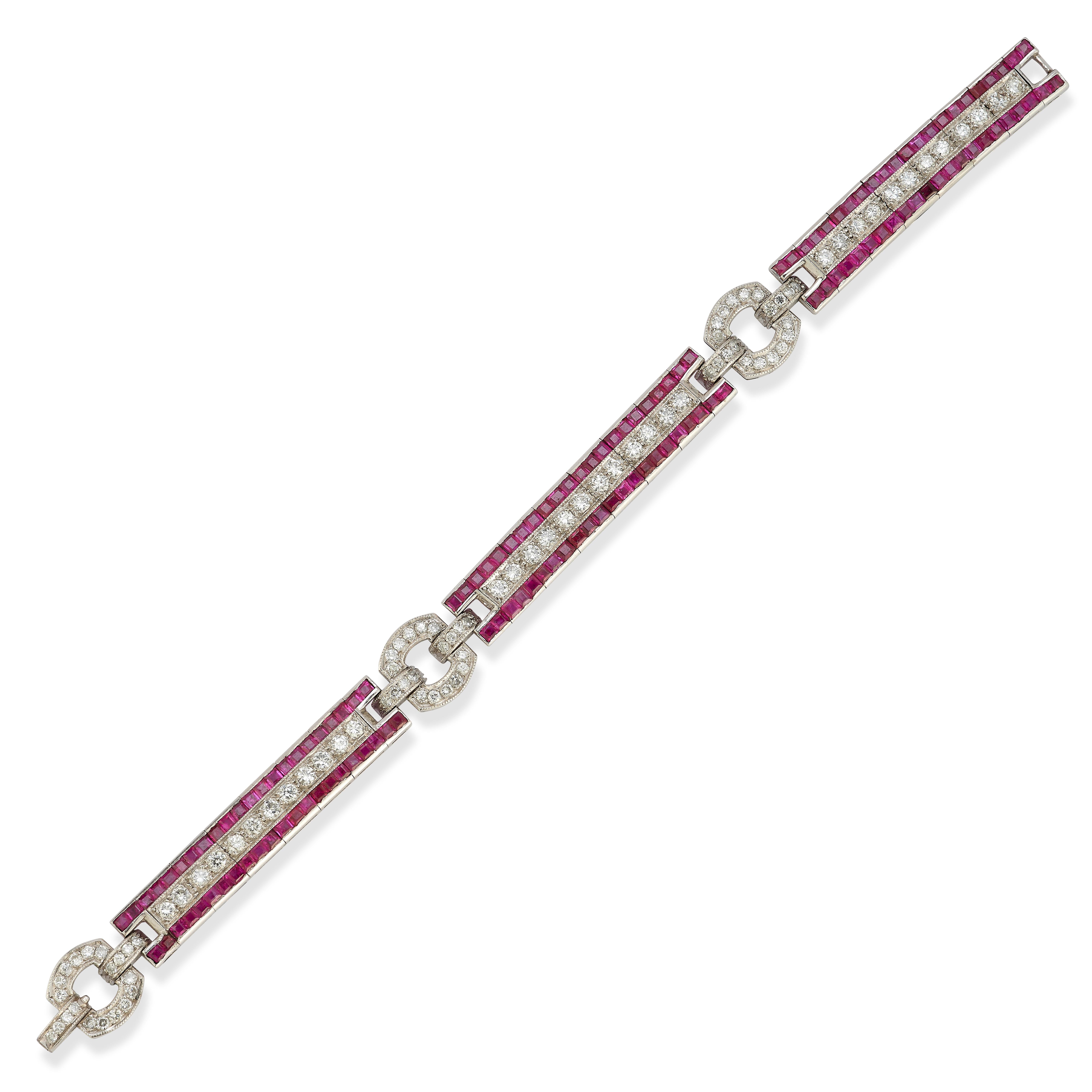 Ruby & Diamond Bracelet, with 132 square cut rubies & 96 round cut diamonds set in platinum.

Ruby Weight: approximately 7.50 carats
Diamond Weight: approximately 5.03 carats

Measurements: 7.5