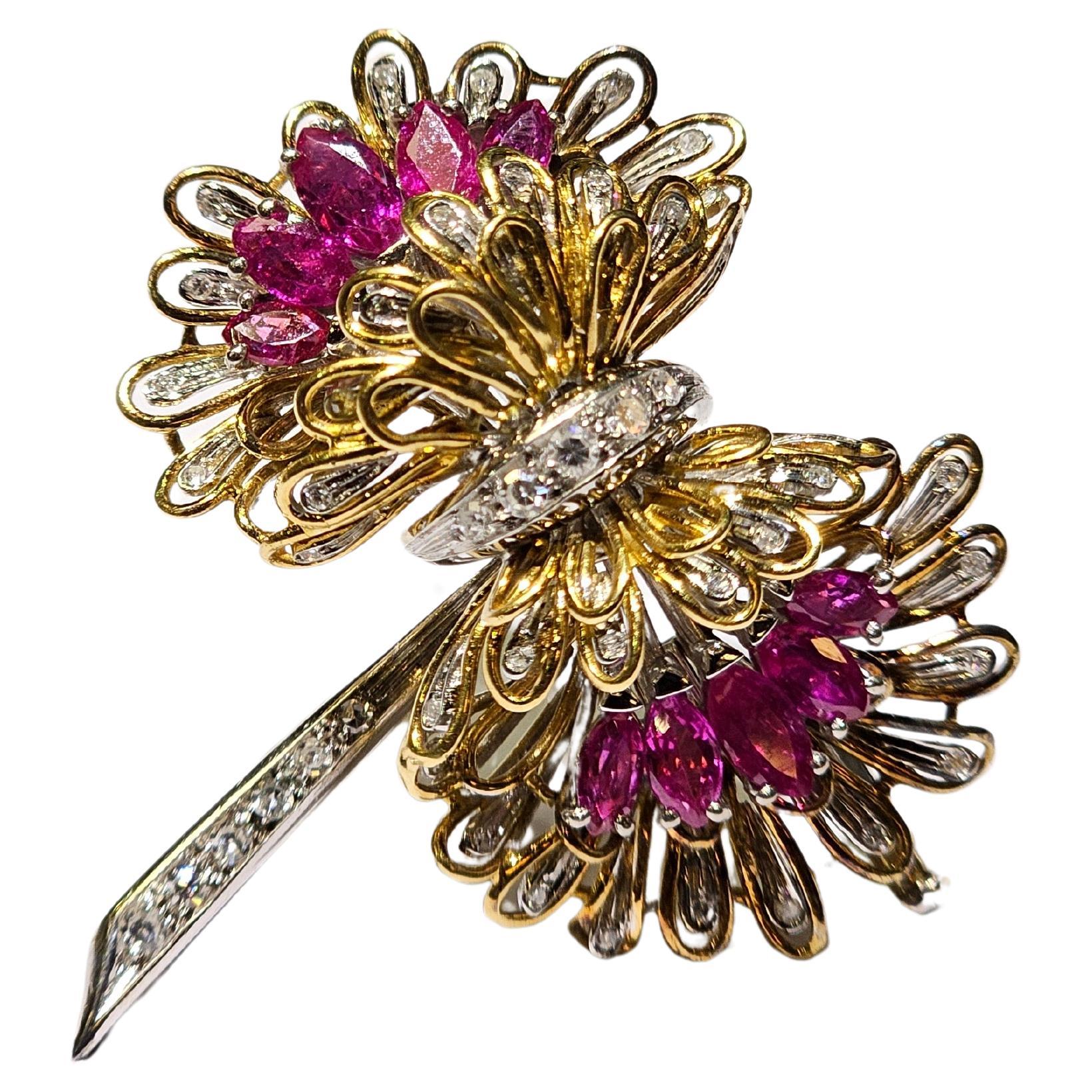 Ruby & Diamond Brooch

An 18-karat two tone gold brooch set with marquise cut rubies and round cut diamonds

Stamped Italy and 18K

Measurements: 1.75