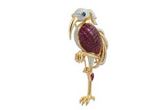 Ruby, Diamond, Cabochon Ruby, Cabochon Blue Sapphire Bird Brooch 18 Karat Gold
