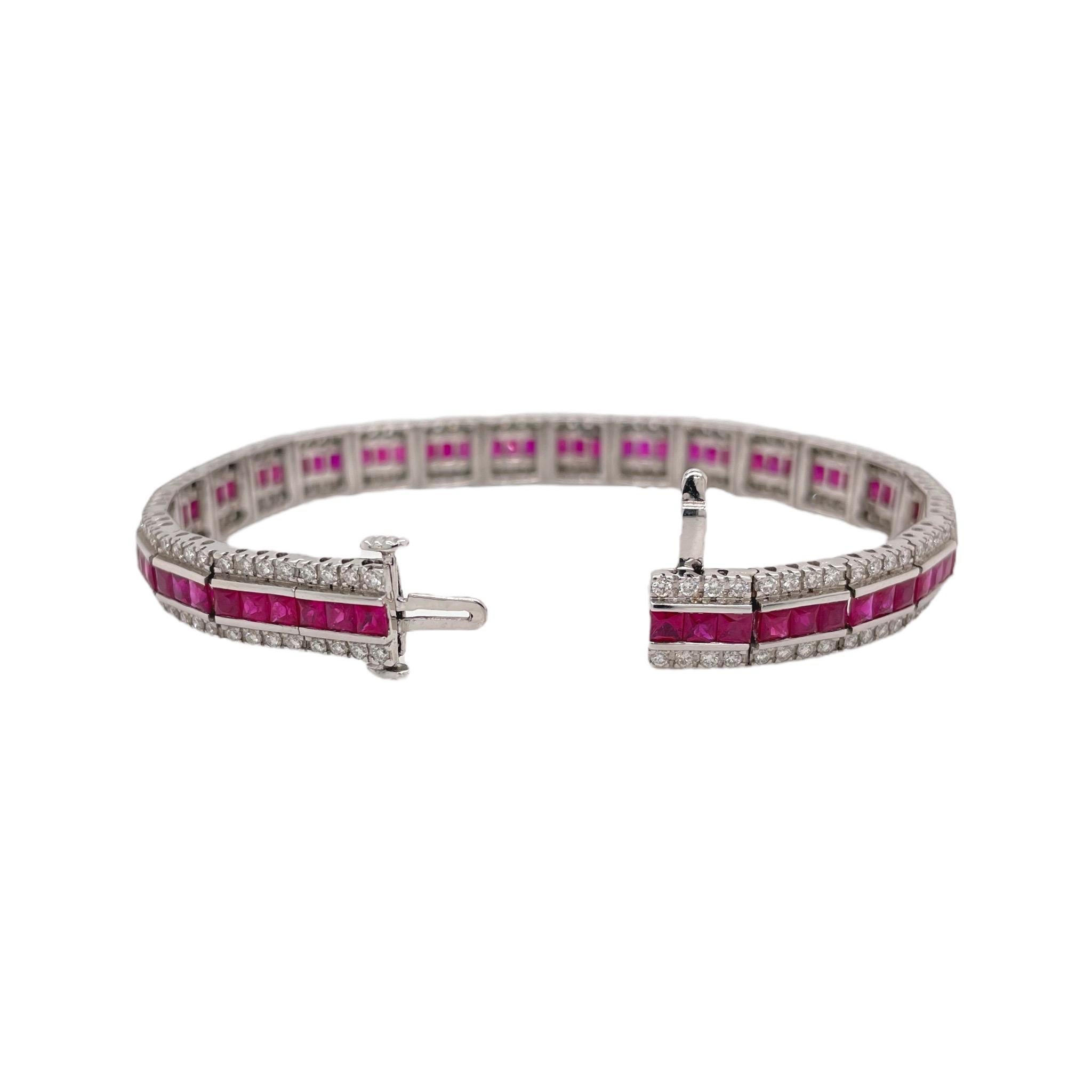 Timeless ruby and diamond bracelet contains 72 square channel set rubies weighing a total of 7.00tcw. Rubies are accented by a single row of round brilliant diamonds on both sides weighing a total of 2.10tcw. Diamonds are near colorless and VS2 in