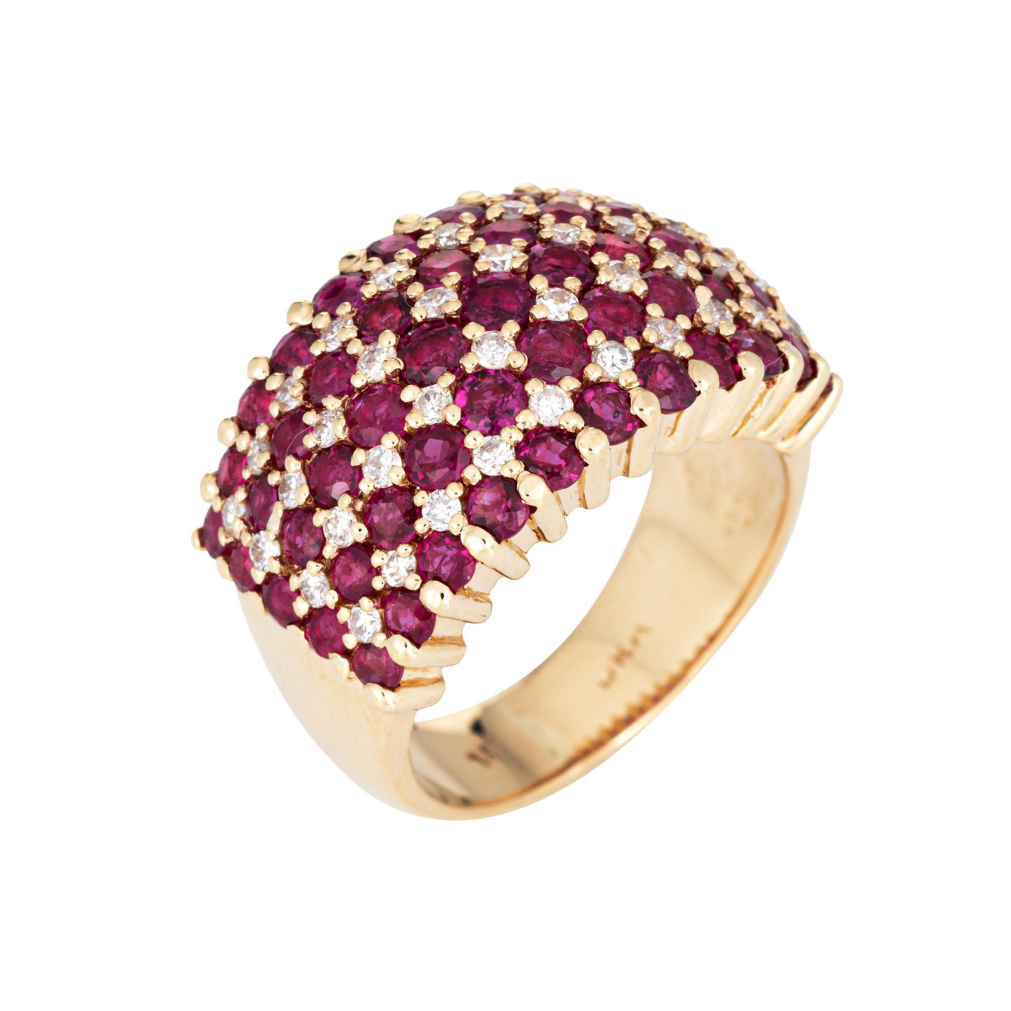 Stylish vintage ruby & diamond cigar band (circa 1980s) crafted in 14 karat yellow gold. 

Forty diamonds total an estimated 0.30 carats (estimated at H-I color and SI1-I1 clarity). Rubies range in size from 1mm to 2mm. The rubies are in good