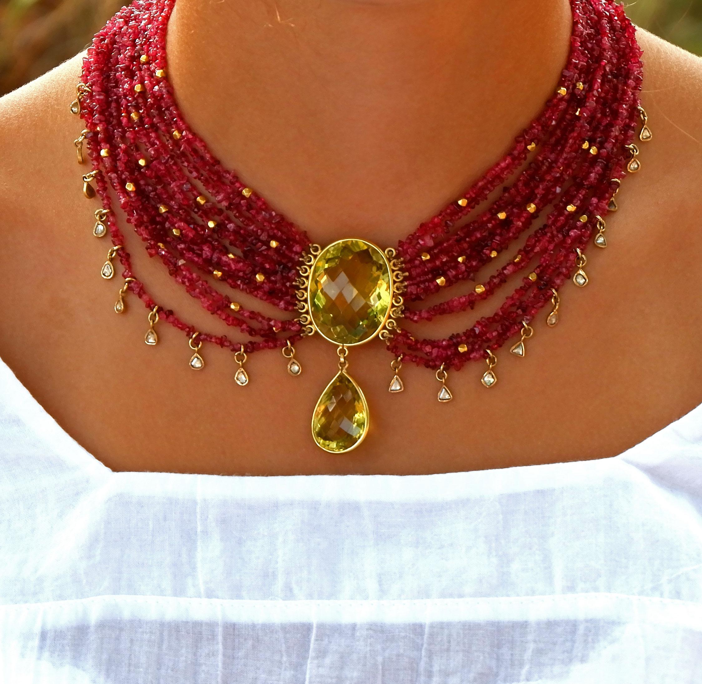 Dazzle with this magnificent and rare ruby and 18 Karat gold necklace! Hand crafted in India using ancient techniques from the time of the Mughal Empire, this elegant necklace evokes the poetry and beauty of times gone by. Easily match it with jeans