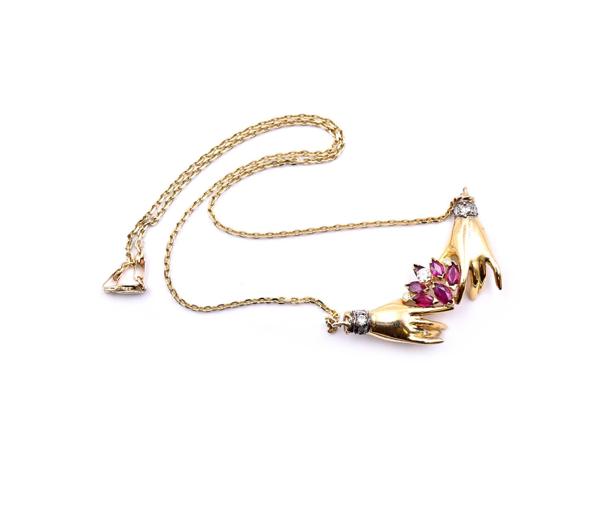 Designer: custom design
Material: 18k yellow gold pendant, 14k yellow gold necklace
Rubies: six marquise cut = 1.00 carat weight
Diamonds: seven round cut = 0.50 carat weight
Color: H-I
Clarity: SI1
Dimensions: necklace is 18-inch long
Weight: 8.43