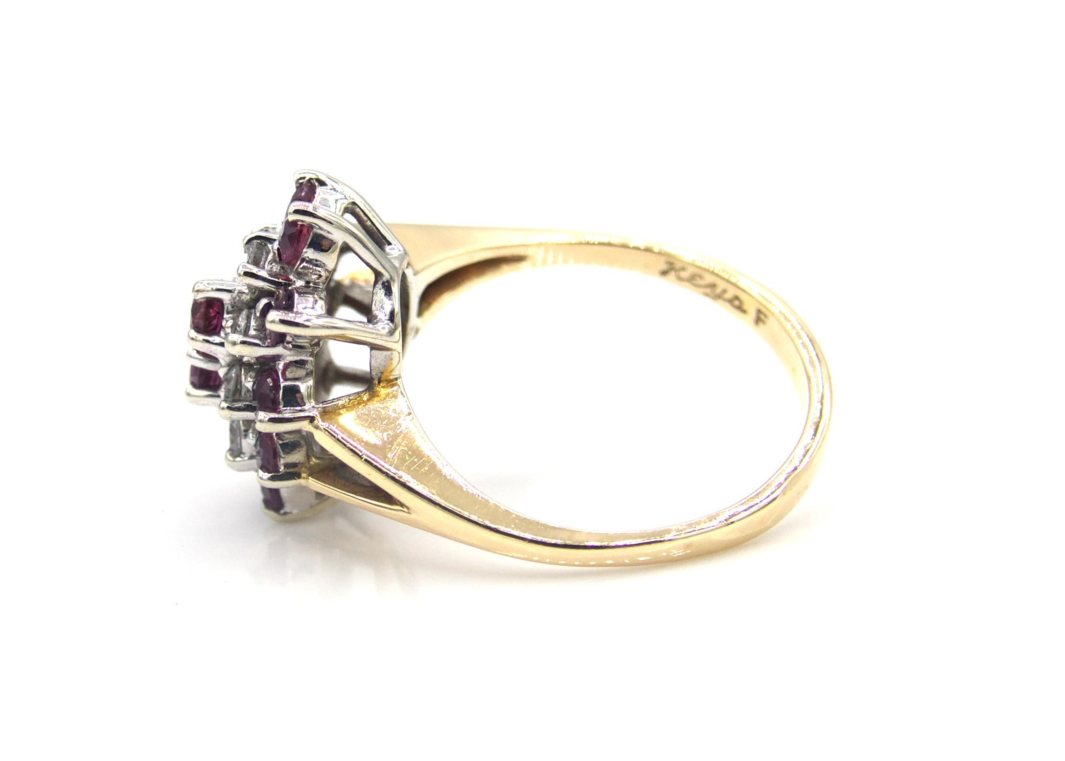 This ruby and diamond cluster ring is set in 14 K yellow gold with white gold prongs to accentuate the bright white diamonds and accent the deep red color of the rubies.

size 6.25

4.1 g