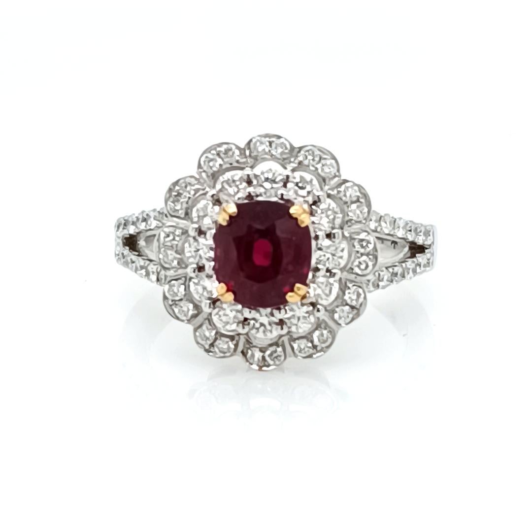 Mozabique Ruby 2.03 Cts encircled by diamonds and 1.13 Cts 

Set in 18K gold 2-Tone, 6.41 Grams