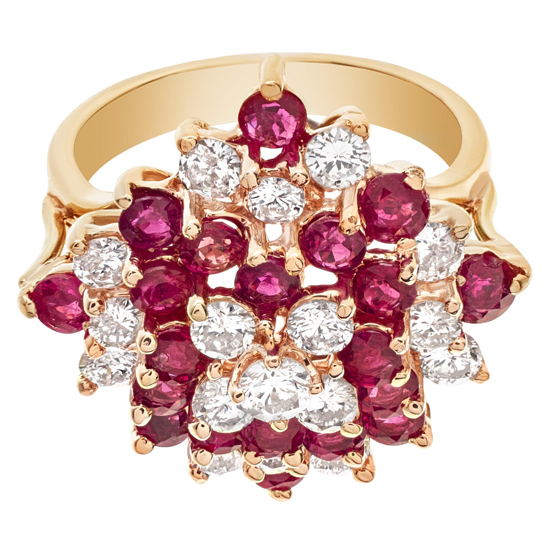 Ruby & diamond cluster ring in 14k yellow gold with approx. 1 carat in G-H color, VS clarity diamonds and 1.50 carats in red rubies. Size 5.75.This Ruby ring is currently size 5.75 and some items can be sized up or down, please ask! It weighs 3.9