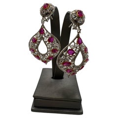 Orecchini da cocktail con diamanti e rubini in oro 18KT
