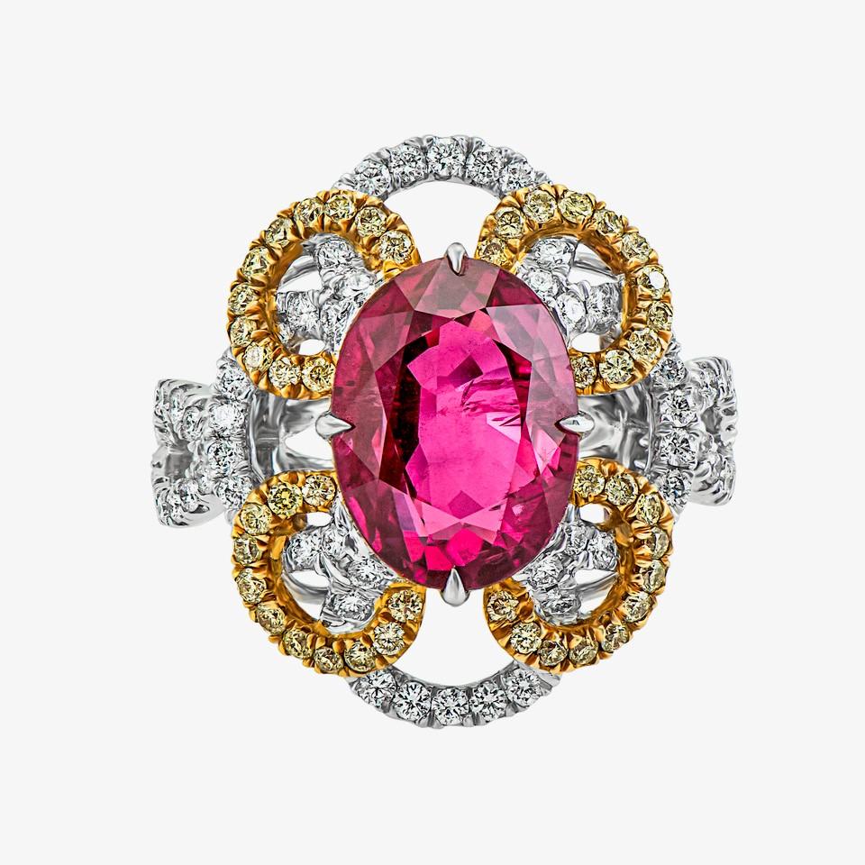 18 karat yellow and white gold Ruby and diamond cocktail ring from Laviere's Venetian Red Collection. The ring is set with 4.6 carat ruby, 0.76 carat white diamonds and 0.29 carat yellow diamonds. 

Gross Weight of the ring: 7.62 grams. Diamond