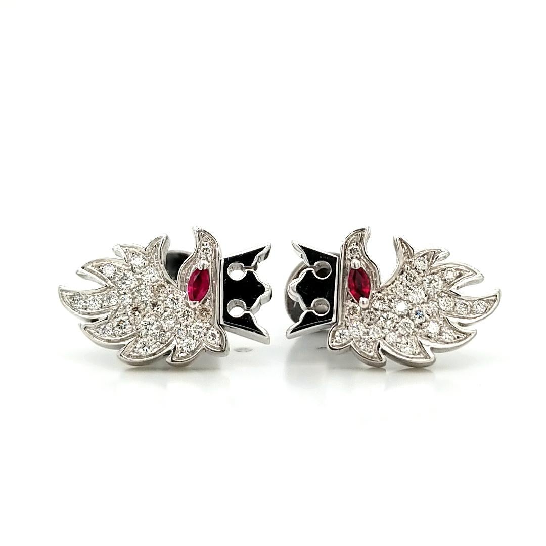 Beautiful and unique cufflinks designed and made by fabulous Cantamessa. 
The cufflinks are made in 18k white gold in the front set with a marquise-shape ruby and round diamonds while the back is made in silver. 
Total weight of the cufflinks is