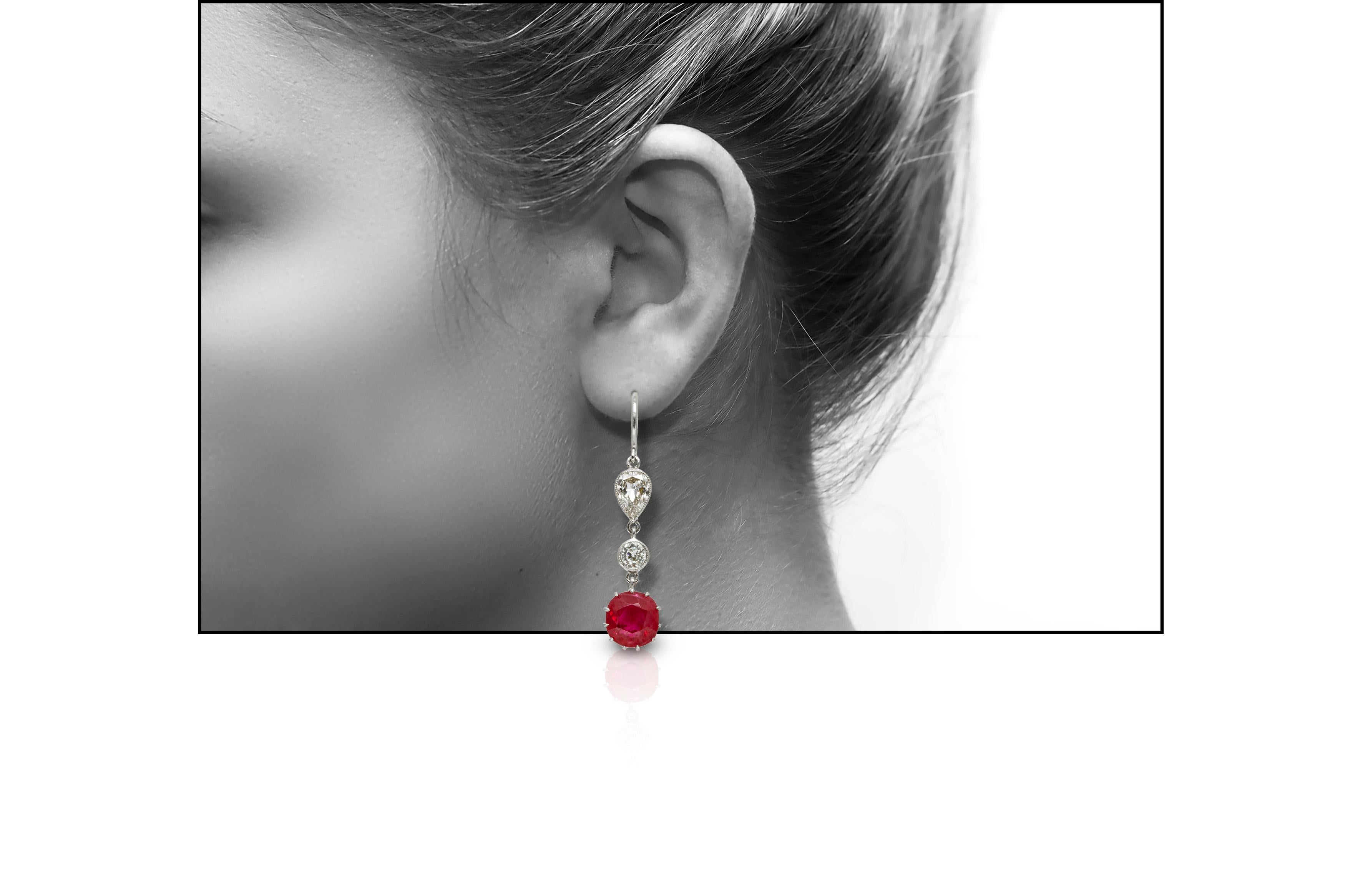 Drop earrings, finely crafted in 18k white gold with diamonds weighing approximately a total of 1.24 carat and rubies weighing approximately a total of 4.21 carat. Circa 2000.