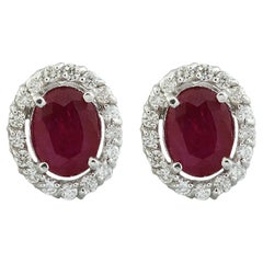 Boucles d'oreilles rubis et diamant en or blanc 14 carats