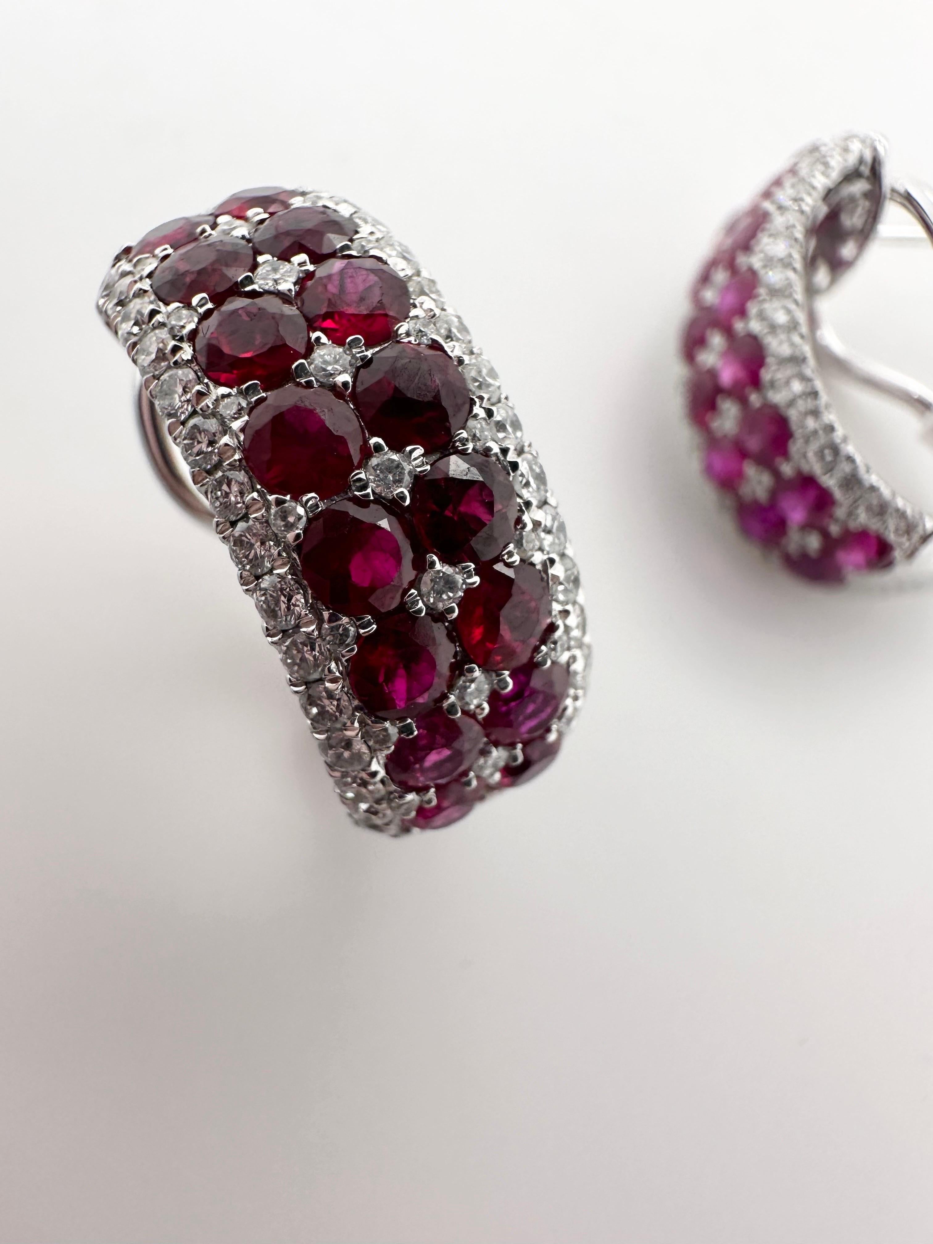 Stunning ruby and diamonds earrings! The rubies are a desired wine color with a touch of pink hue, the diamonds are VS clarity and F color totalling 0.74 carats. Earrings are luxurious when on ears and very comfortable made in 18KT white