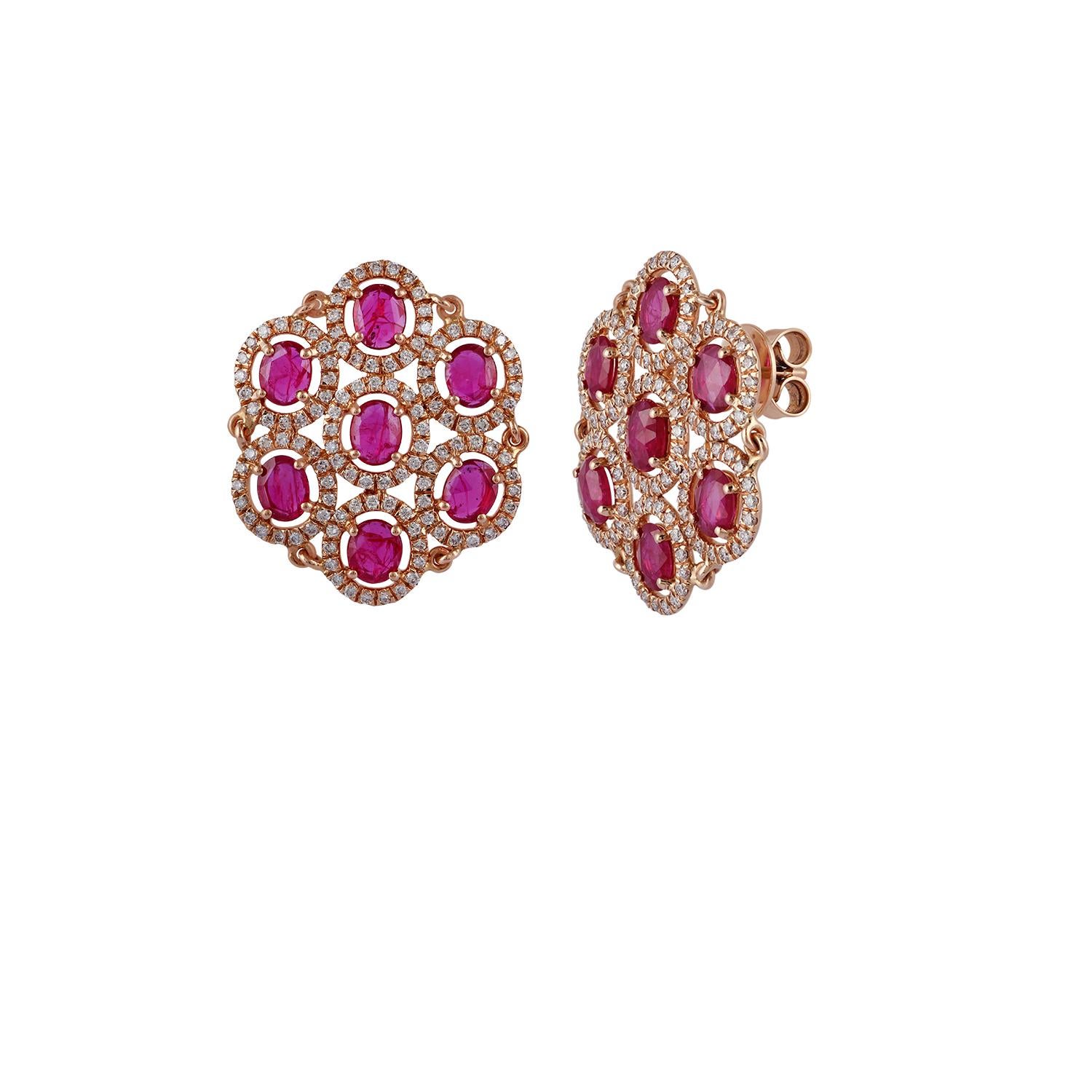 An exclusive pair of earrings with 14 rose-cut rubies (3.85 carats), 238 round brilliant cut diamond (1.17 carats) studded in 18K rose gold (7.37 grams) with a simple pull-push mechanism. This is an elegant & wearable earring.