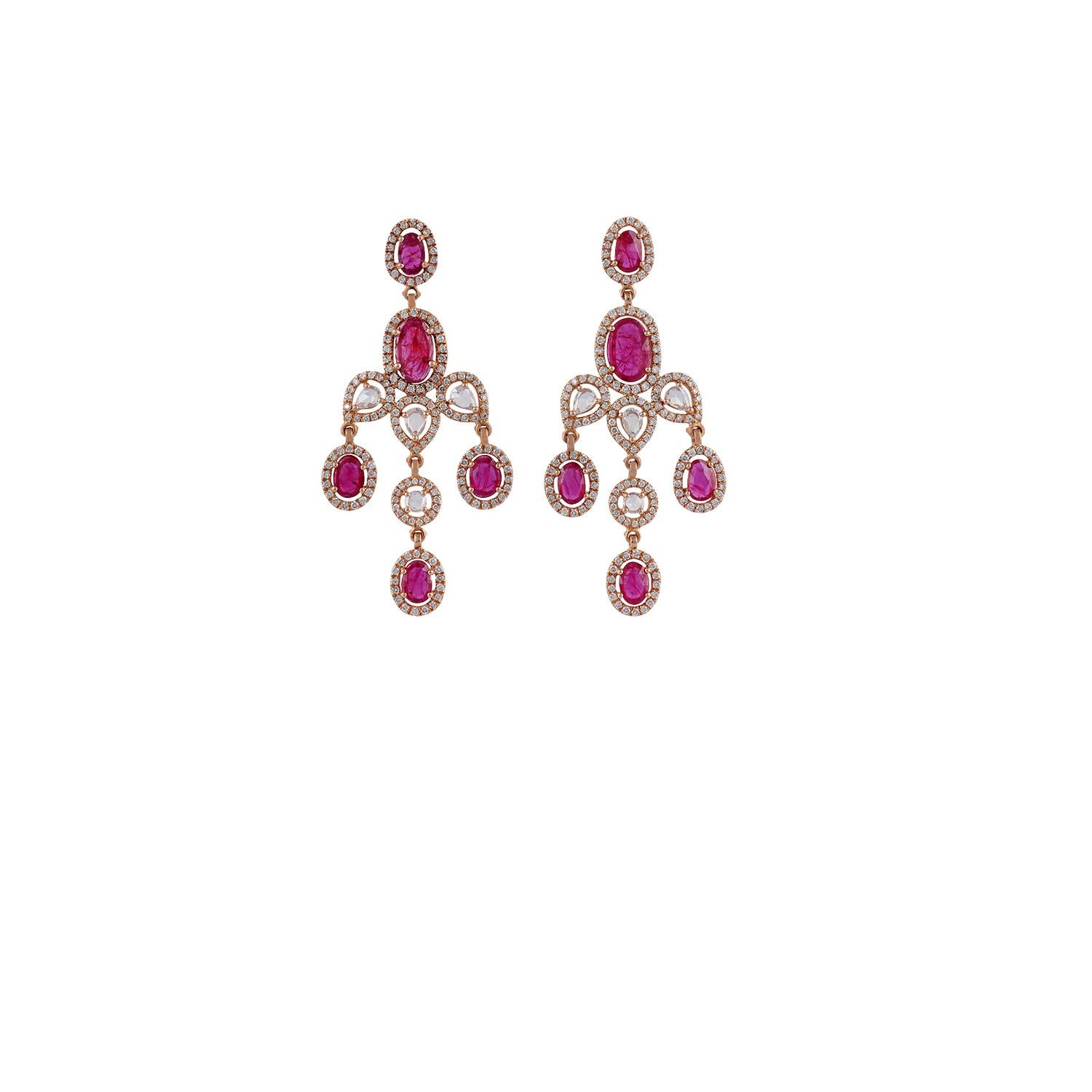 This is an exclusive ruby & diamond earrings feature 10 pieces of rose-cut Mozambique rubies weight 3.48 carats, 8 pieces of rose-cut diamonds weight 0.62 carat & 313 pieces of round brilliant cut diamonds weight 1.75 carats around the rubies in the