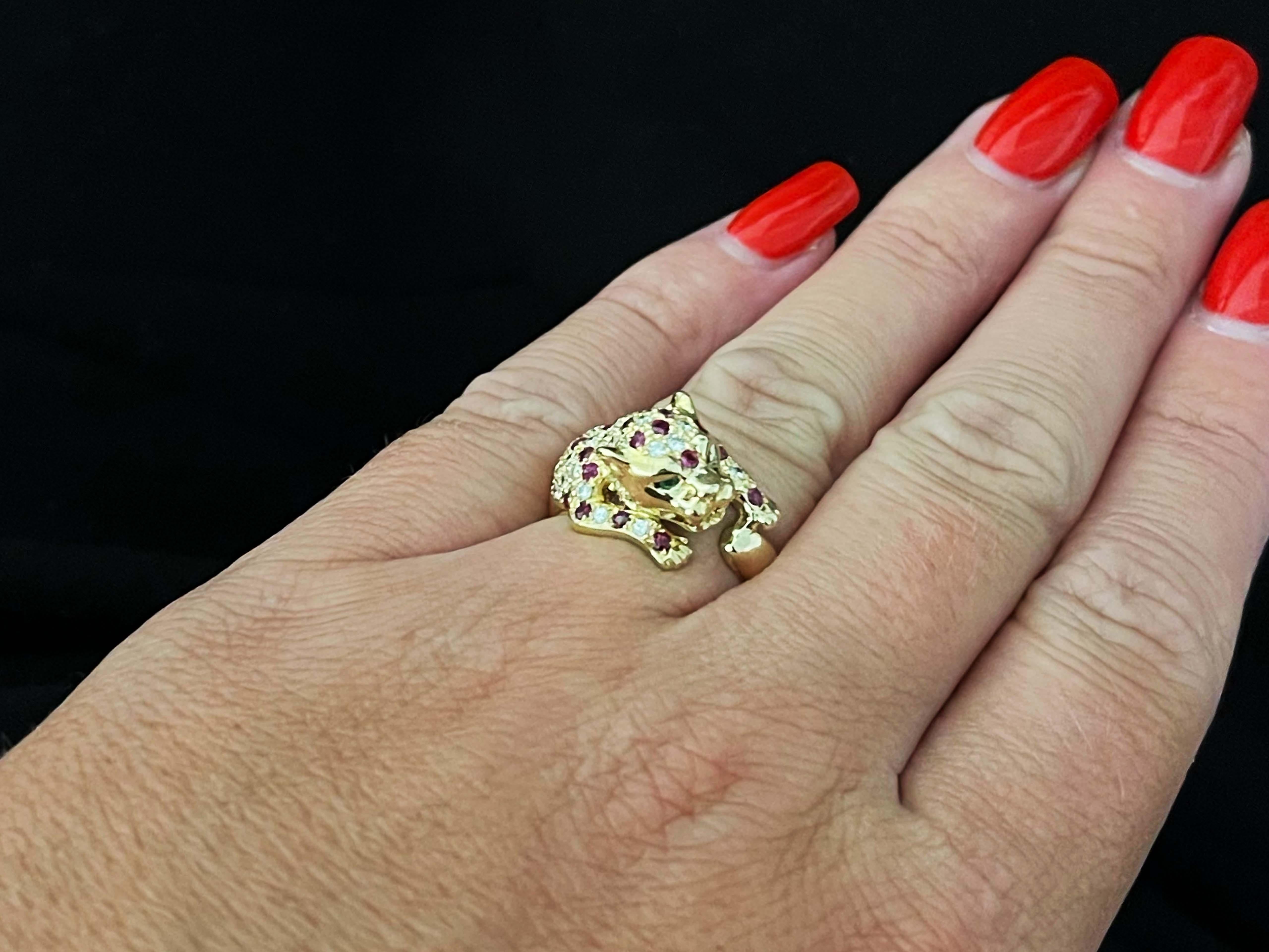 Item Specifications:

Metal: 14K Yellow Gold

Style: Statement Ring

Ring Size: 5.5 (resizing available for a fee)

Total Weight: 6.1 Grams

Emerald Carat Weight: ~0.02 carats

Ruby Carat Weight: ~0.50 carats

Diamond Carat Weight: ~0.35