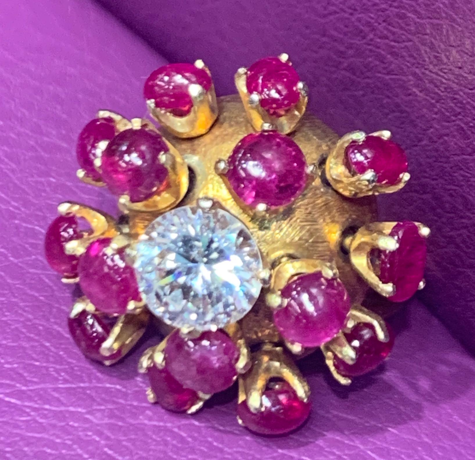 Ruby & Diamond En Tremblant Cocktail Ring 14K Yellow Gold Circa 1960
Diamond Weight: 1.80 Cts
Ruby Weight: 6.70 Cts
Ring Size: 5.5
Re-sizable free of charge 