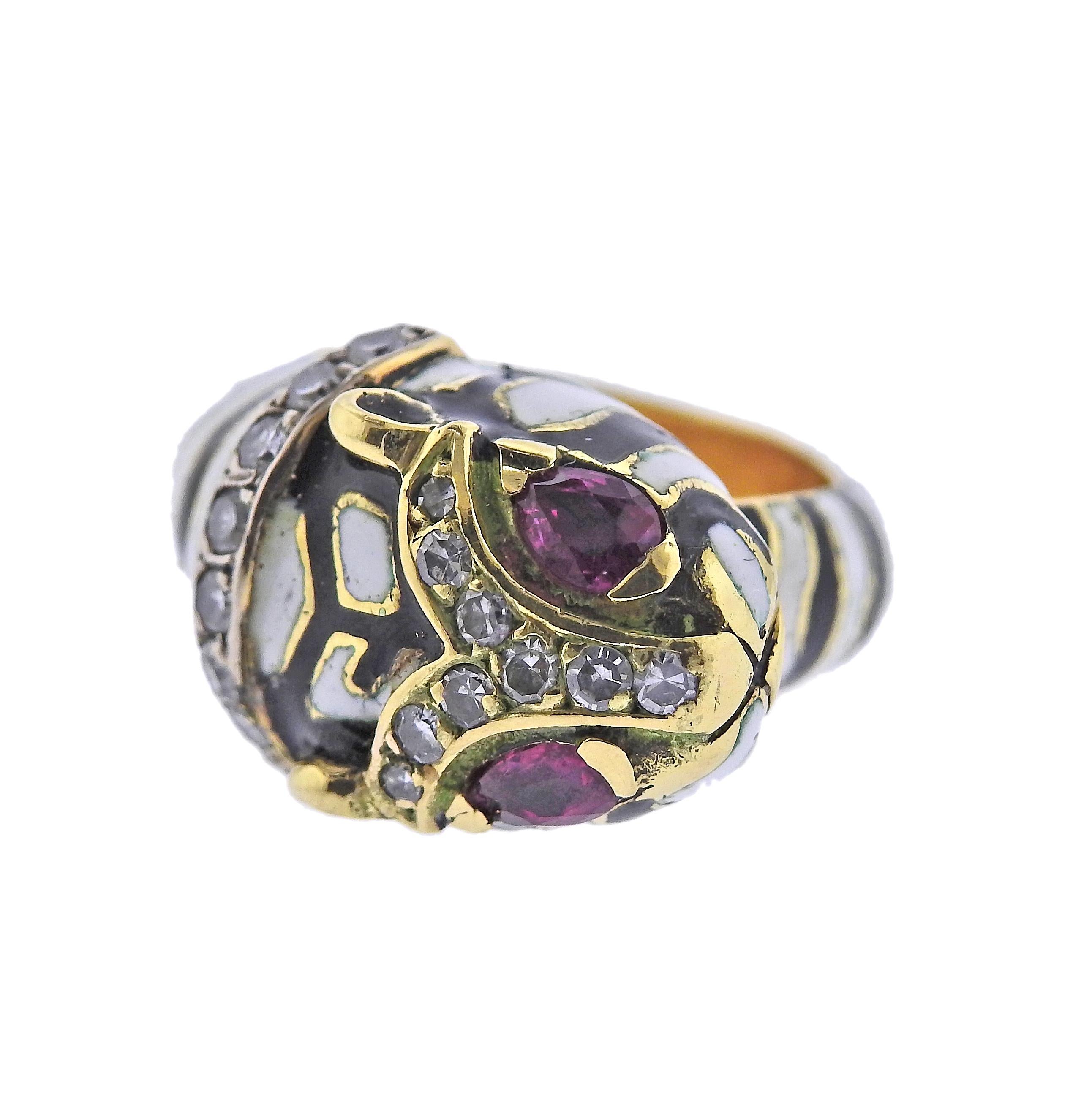 Vintage 18k gold tiger ring, decorated with enamel, ruby eyes and approx. 0.56ctw in diamonds. Ring size - 5, ring top is 13mm wide. Weight - 12.2 grams.
