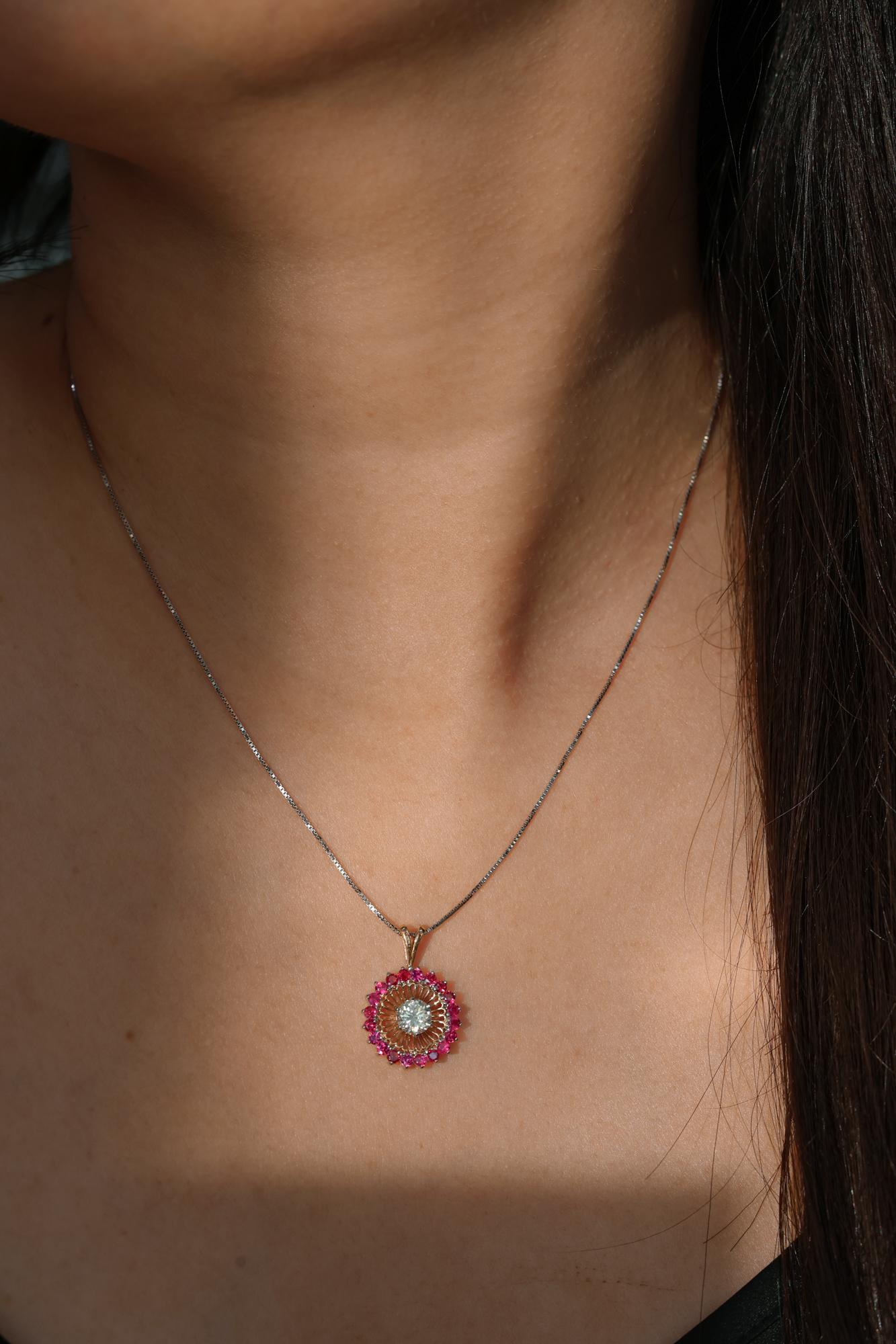 -18K Yellow Gold 

-Center Diamond 0.50 cts. 

-Round Rubies

-0.50 cts.
