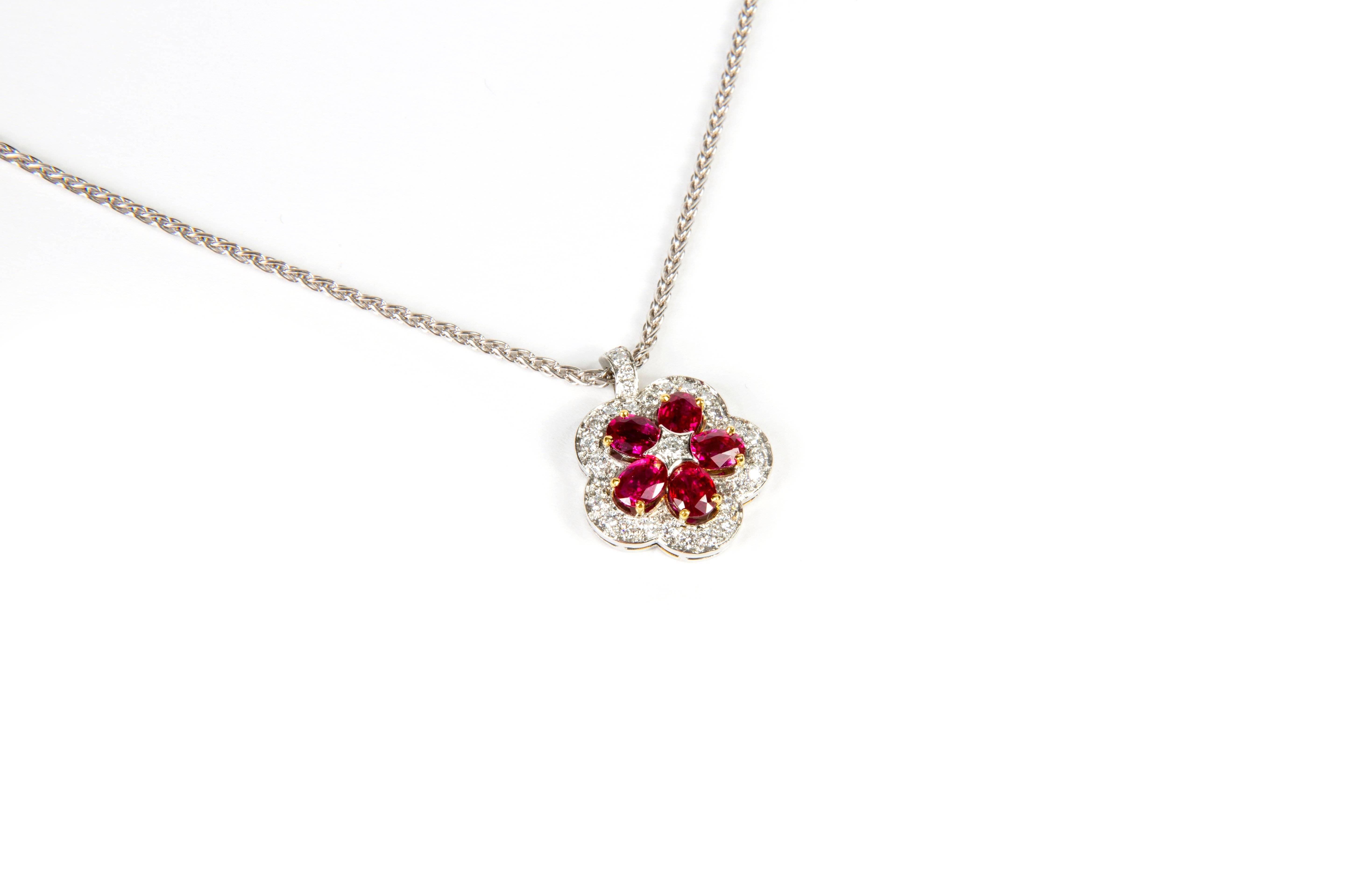 Oval Rubies and Diamonds Pendant 
5 Rubies 1.89cts and Diamonds 0.41cts
18k white gold chain included (42cm long)
