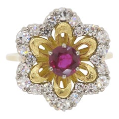 Ruby 
Diamond Flower Ring Crafted in 18k Yellow Gold