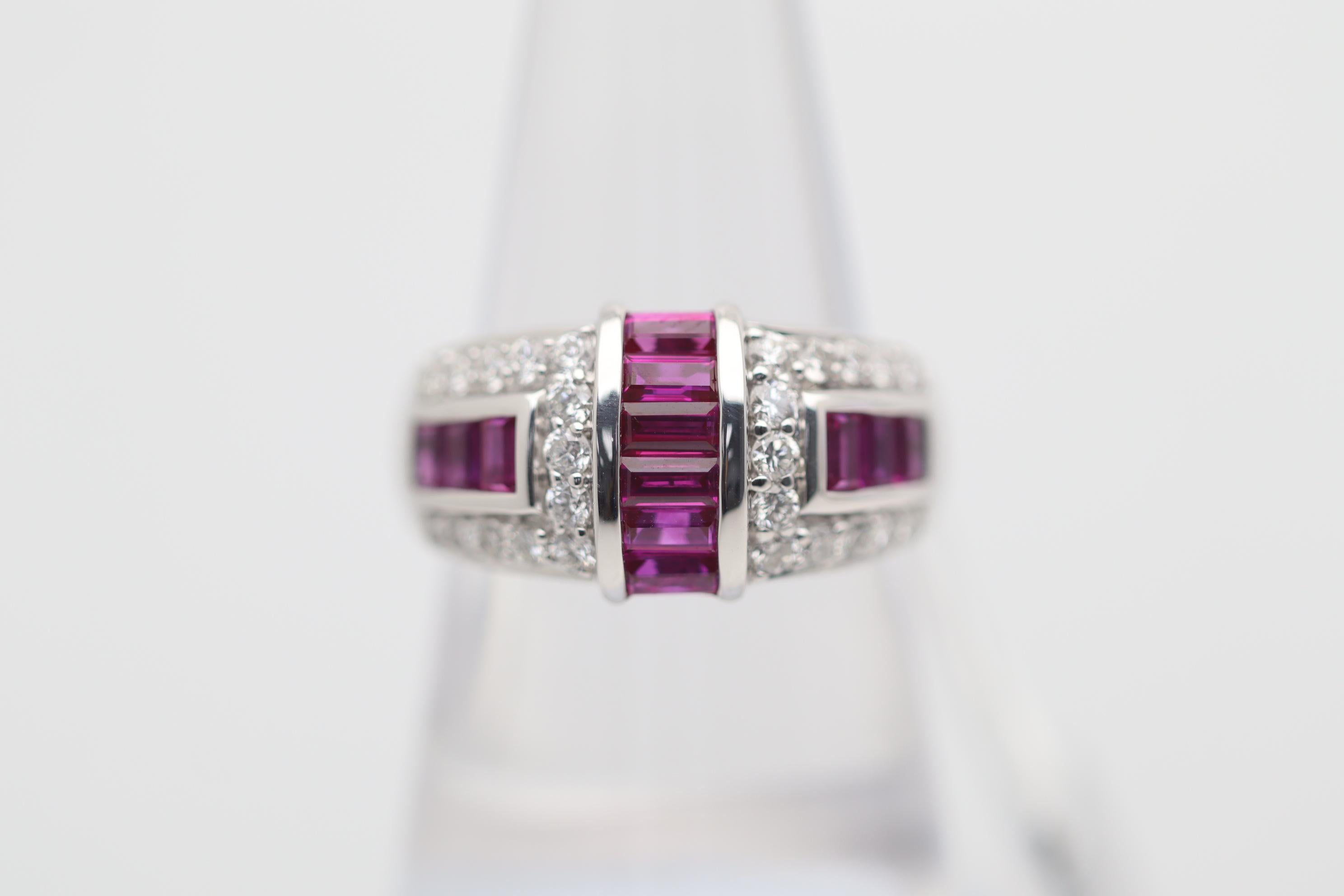 A sleek and stylish ring featuring 1.41 carats of fine baguette-cut rubies with a rich bright red color. They are accented by 0.67 carats of fine round brilliant-cut diamonds which add brilliance and sparkle to the ring. The stones are set in a