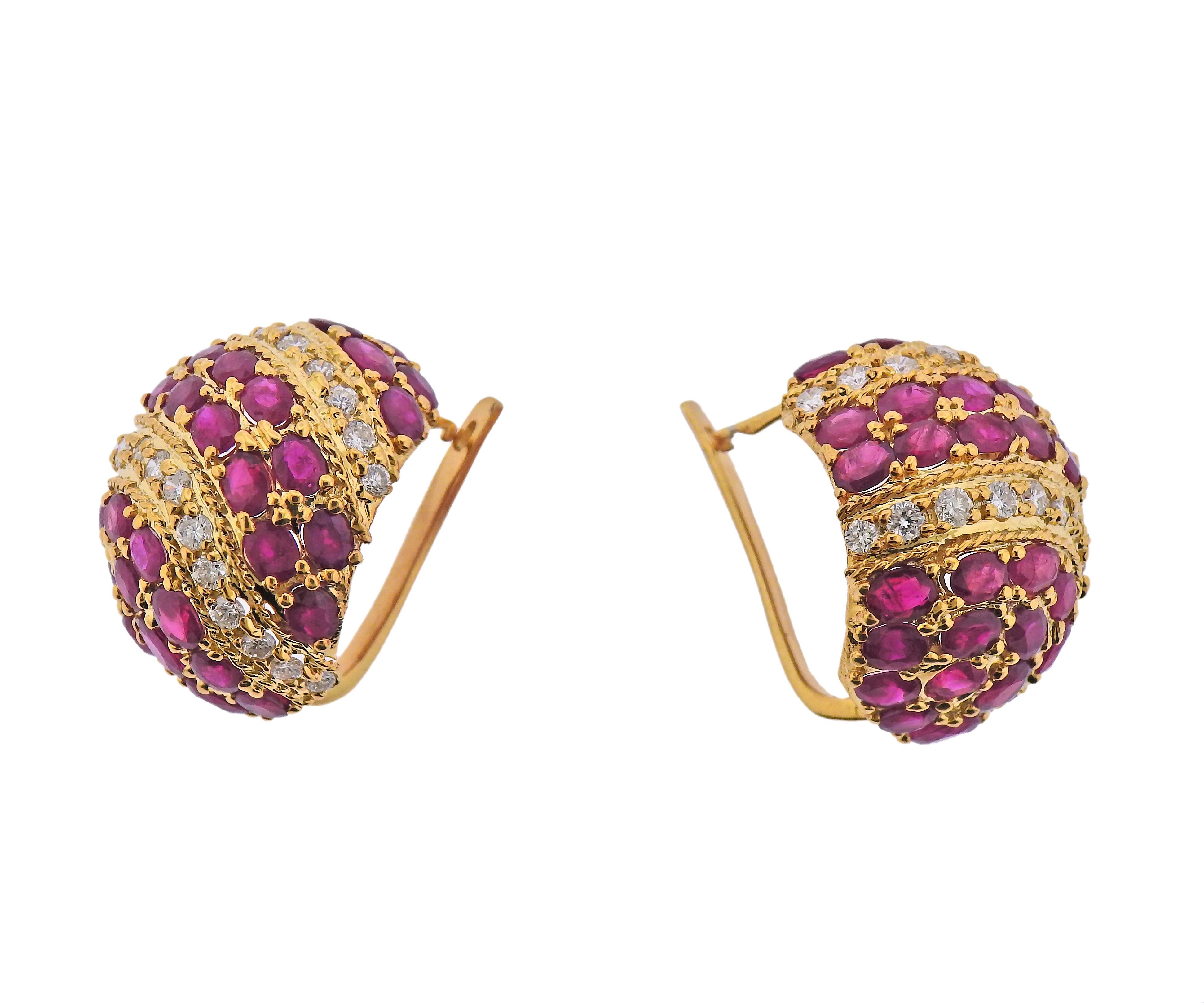 Pair of large bombe earrings in 14k gold with rubies and approx. 1.04ctw in diamonds. Earrings are 27mm x 25mm. Weight - 22.2 grams. 