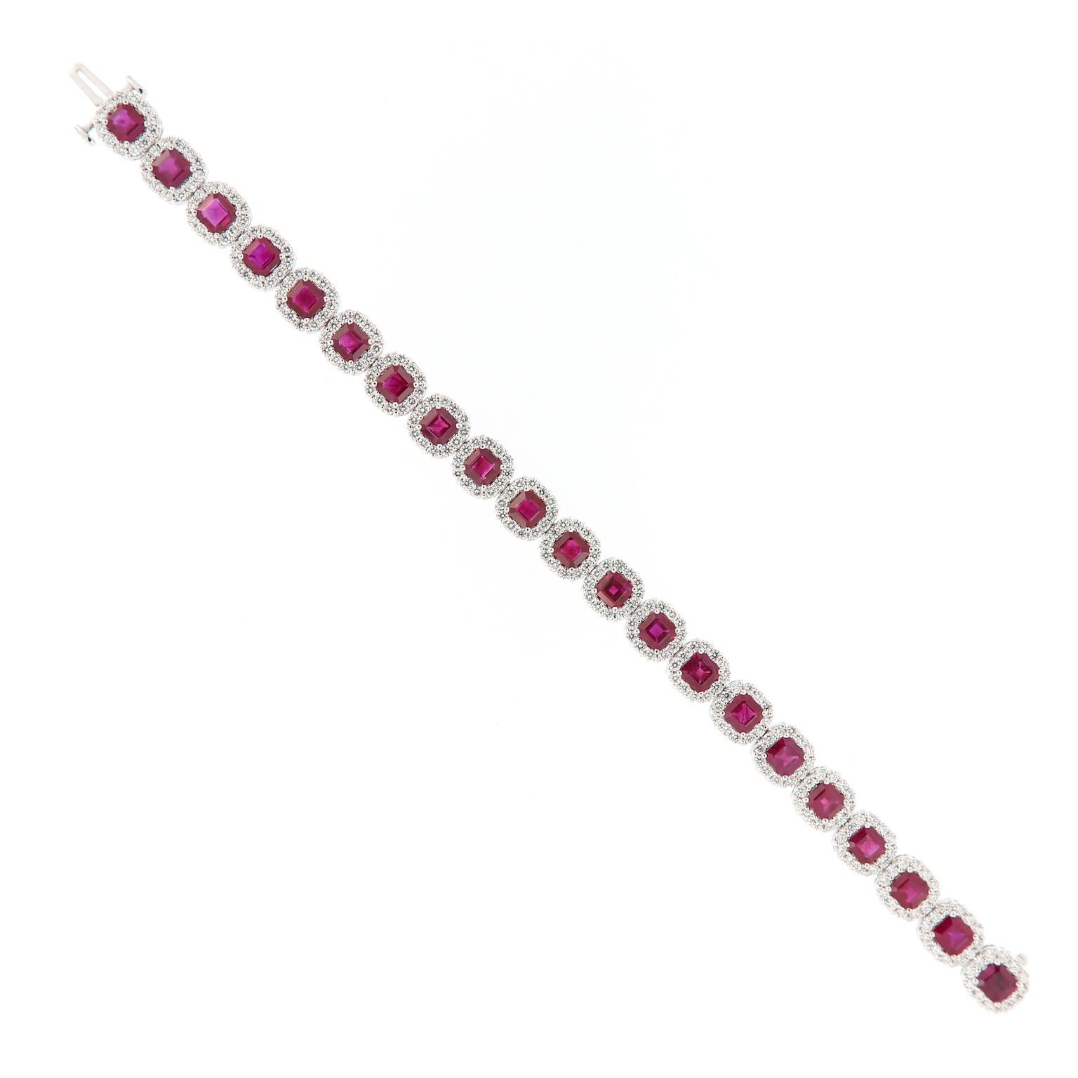 This stunning bracelet for her features 21 square step cut rubies accented with round brillliant cut diamonds. Expertly crafted in 18k white gold. Weighs 24.1 grams.

Rubies 11.84 cttw
Diamonds 4.70 cttw VS,G-H