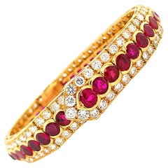 Pulsera de oro con diamantes y rubíes