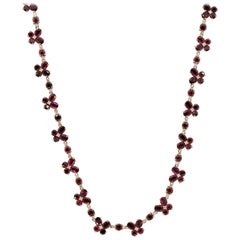 Lange Halskette aus Gold mit Rubinen und Diamanten