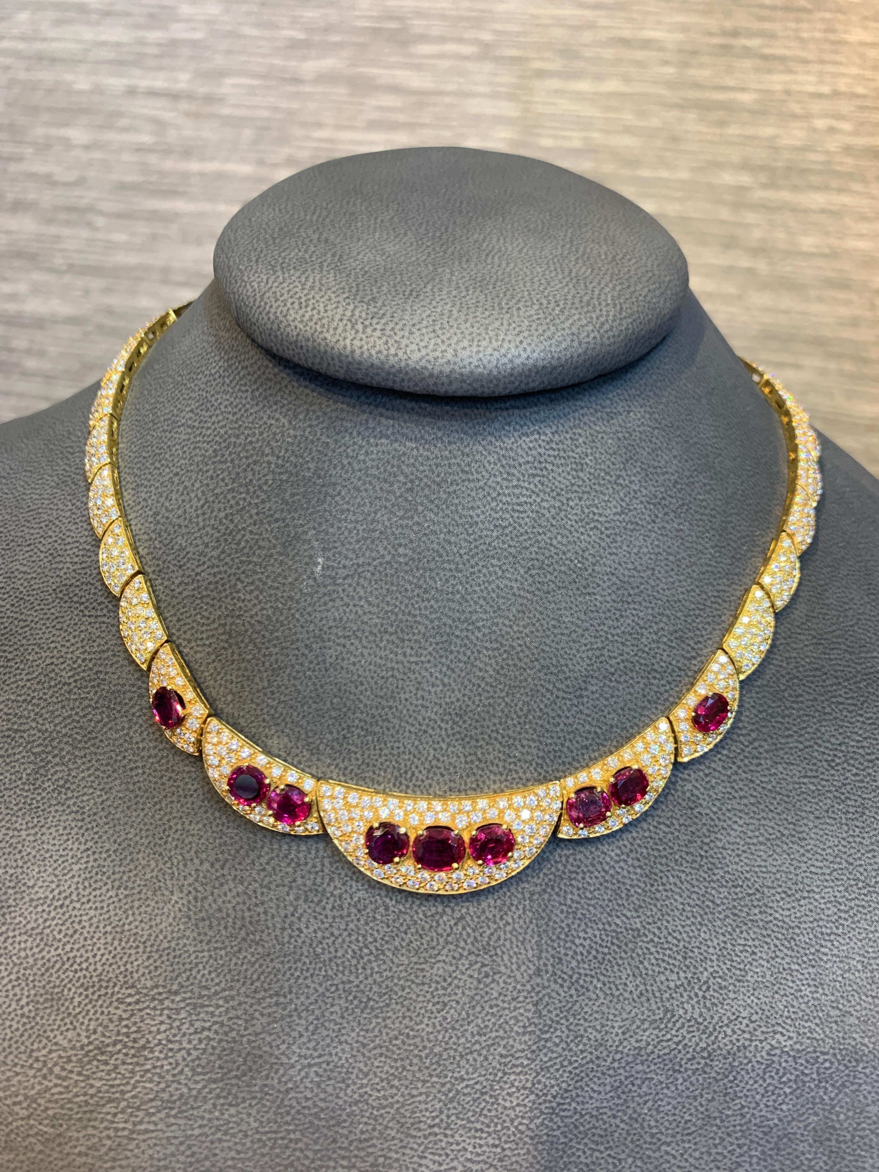 Ruby & Diamond Gold Necklace, Pave set Diamonds with 9 Oval Cut Ruby stones set in four prongs.
Approx Length: 16