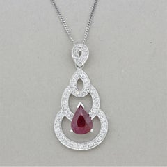 Pendentif en or or avec rubis et diamants