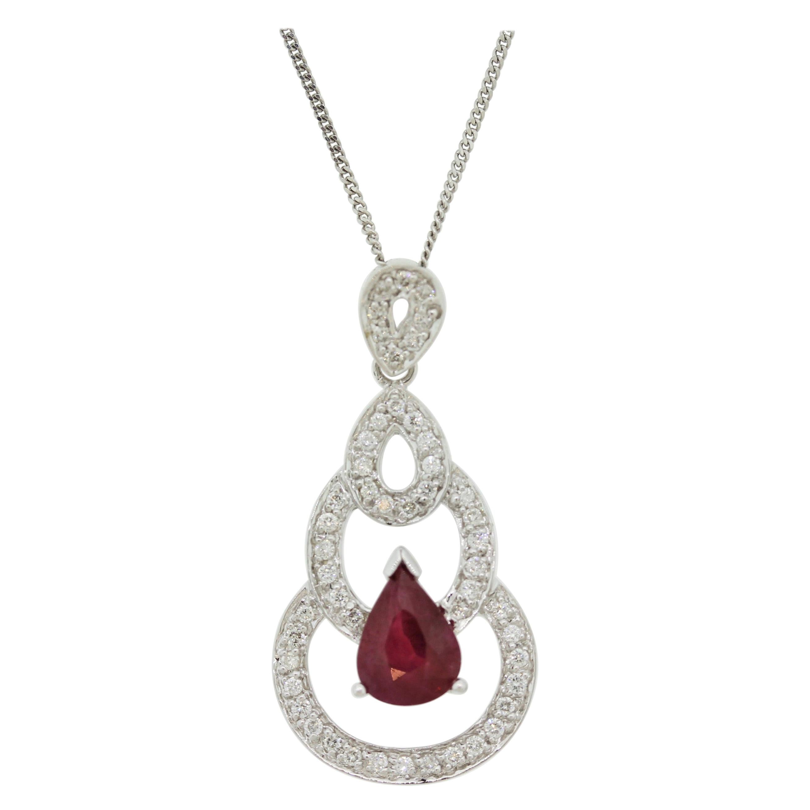 Ciondolo in oro con diamante e rubino