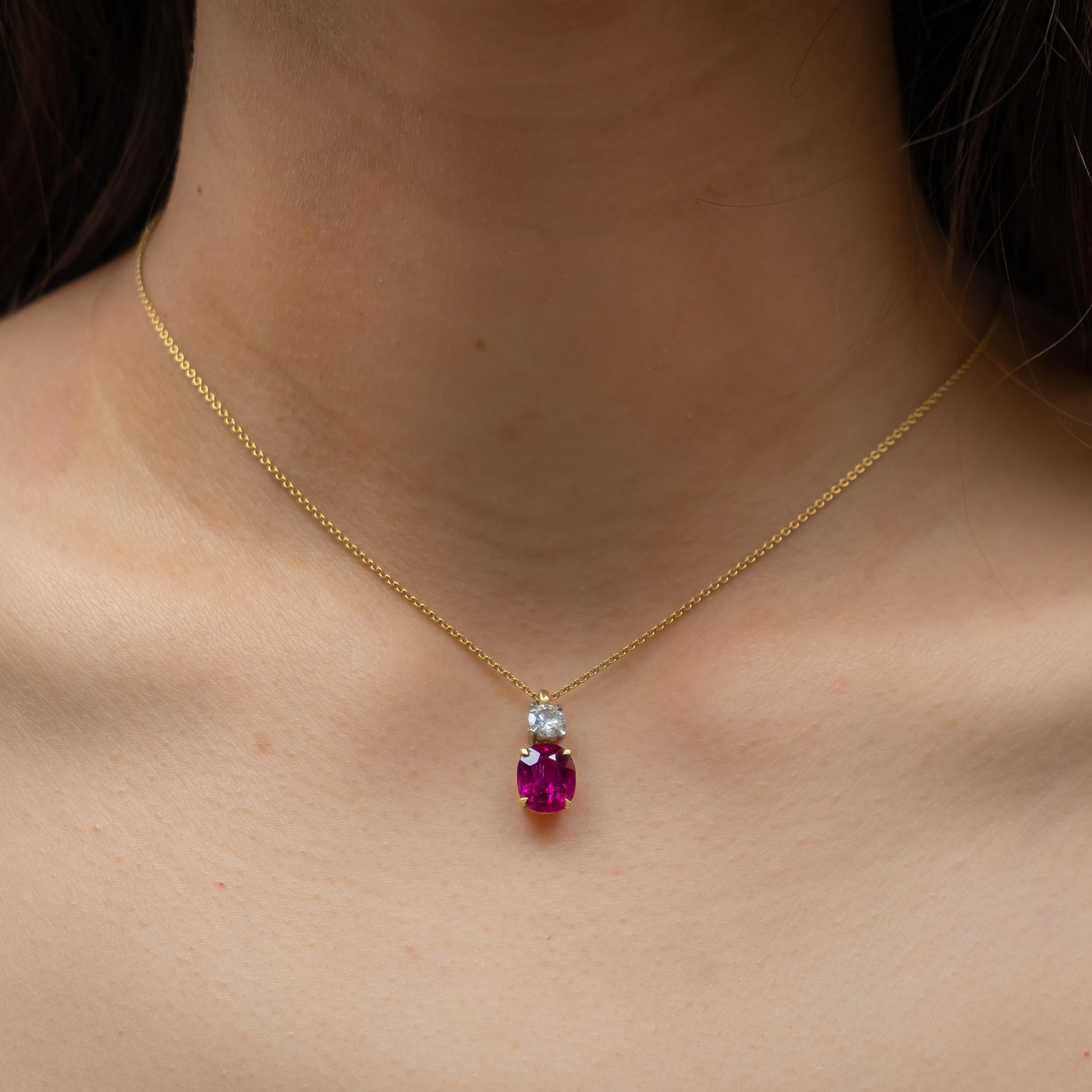 A ruby and diamond pendant, set with a 3.18ct cushion-cut faceted mixed-cut ruby, with a 0.40ct F VVS1 round brilliant-cut diamond, mounted in 18ct white gold, with a 16