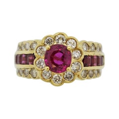 Anillo de oro con diamante y rubí